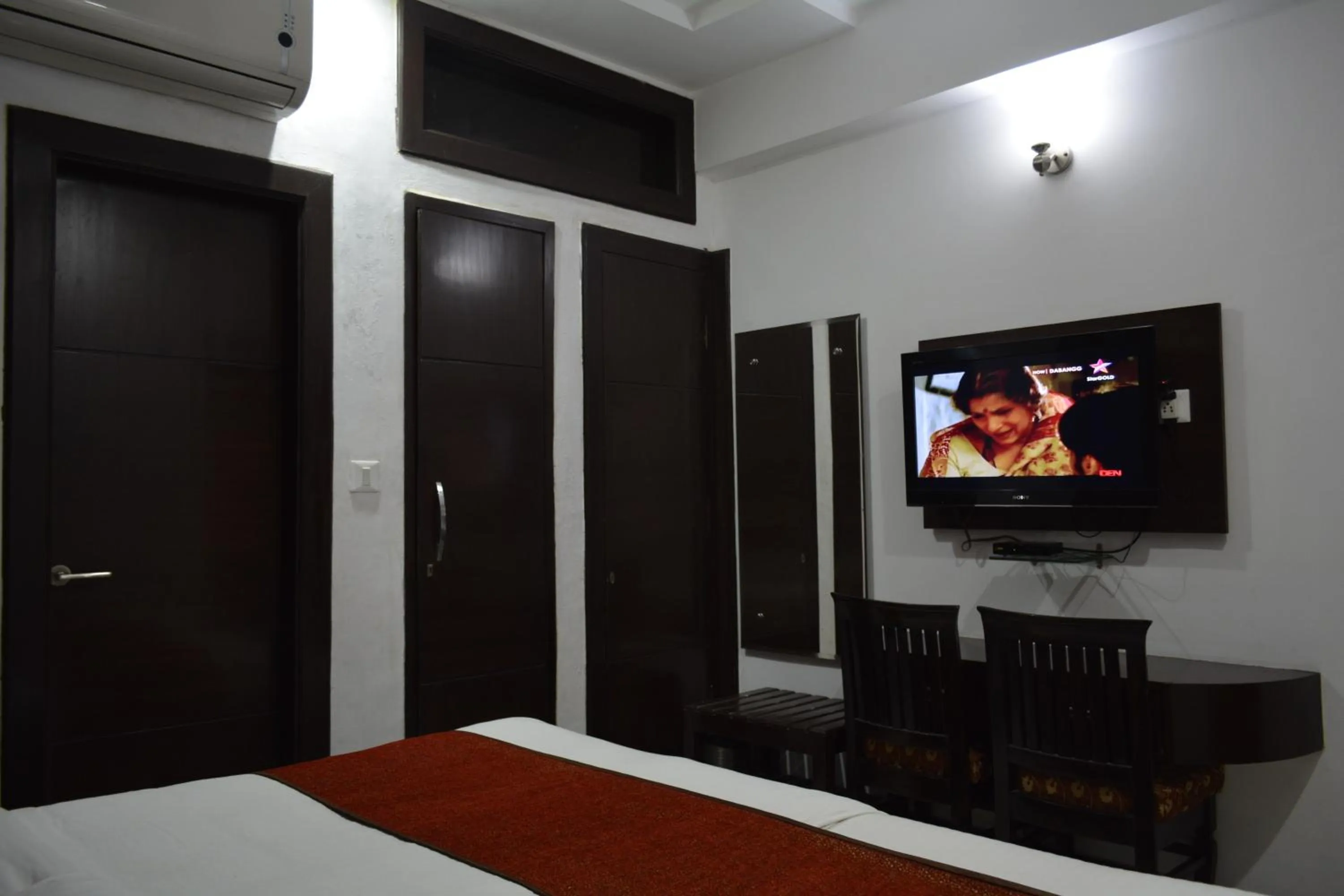 Bed in Hotel Samovar by Goyal Hoteleirs