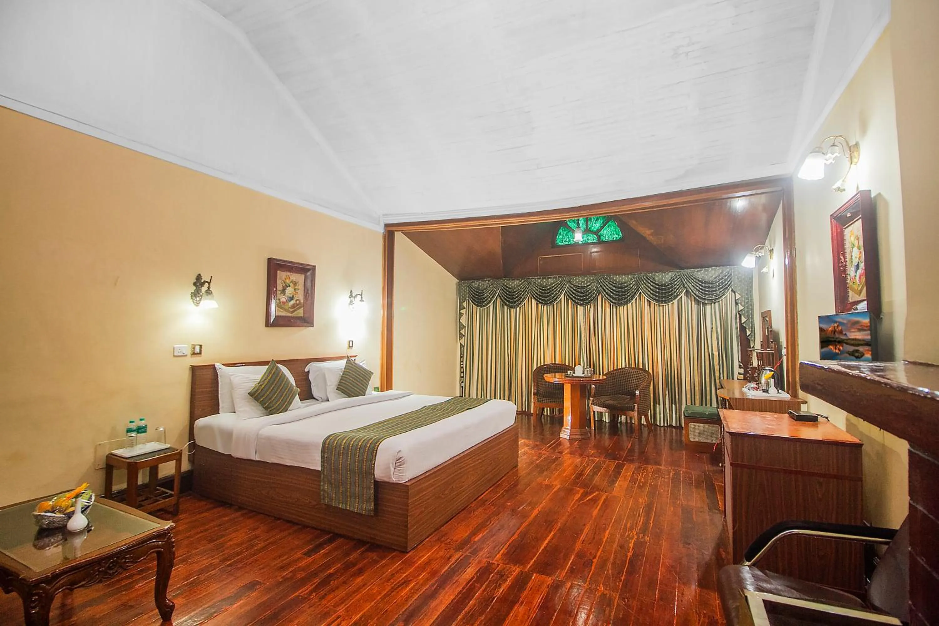 Bedroom in Central Heritage Resort & Spa Formerly Fortune ITC Resort