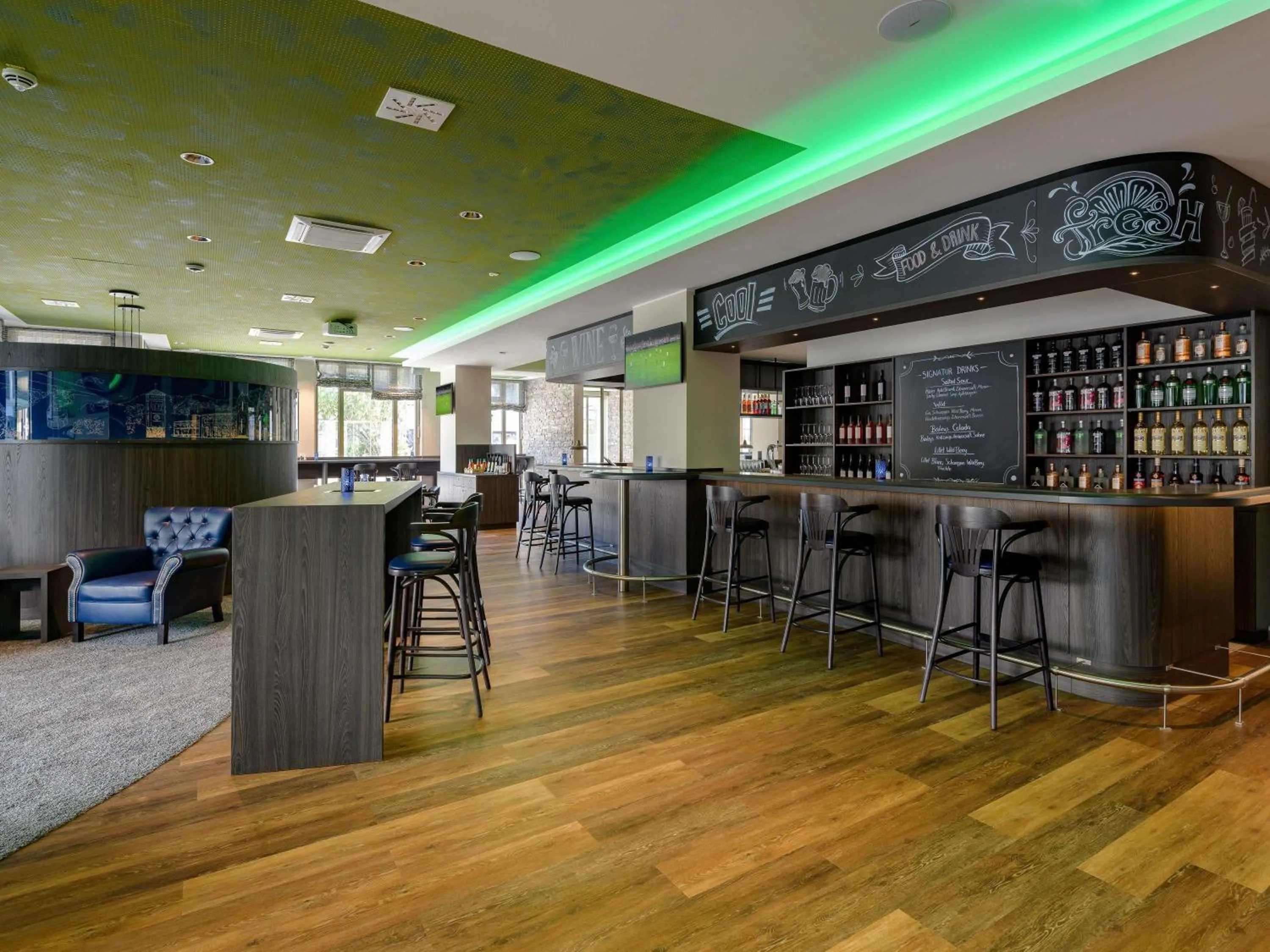 Lounge or bar in ibis Styles Bad Reichenhall