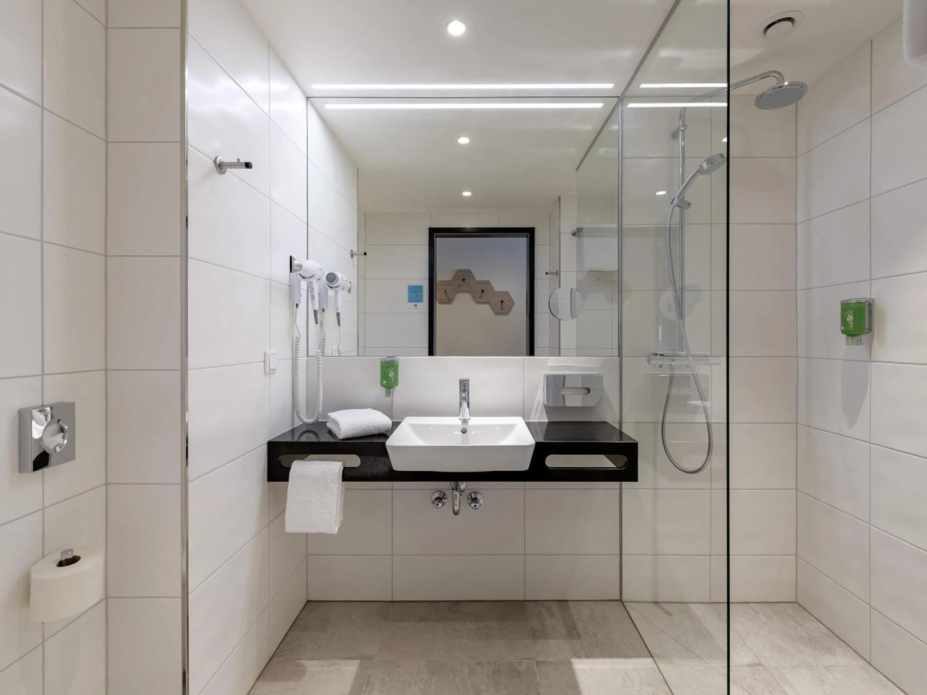 Bedroom in ibis Styles Bad Reichenhall