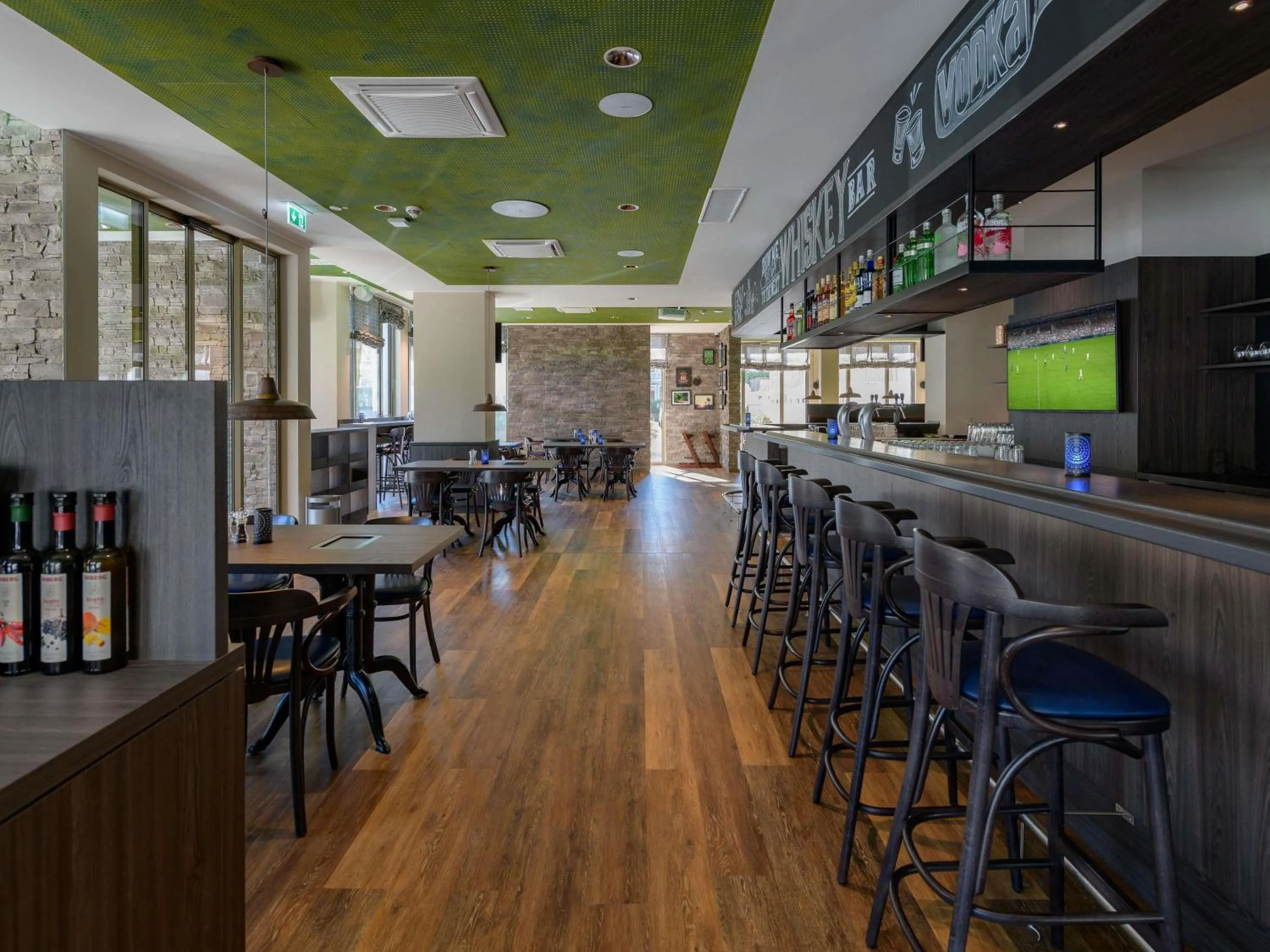 Lounge or bar in ibis Styles Bad Reichenhall