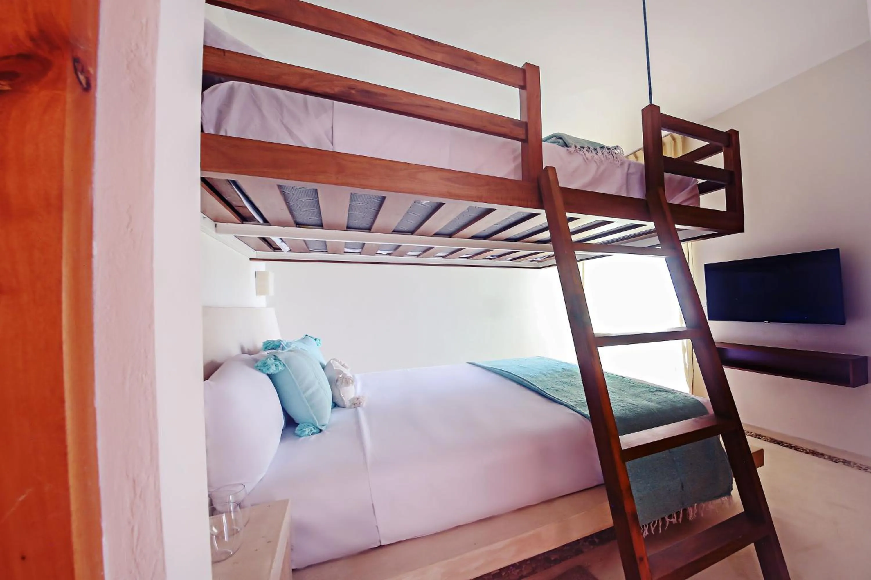 TV and multimedia, Bed in Casa Astral Eco Luxury Holbox Island - Sunset and Ocean View with Rooftop Pool