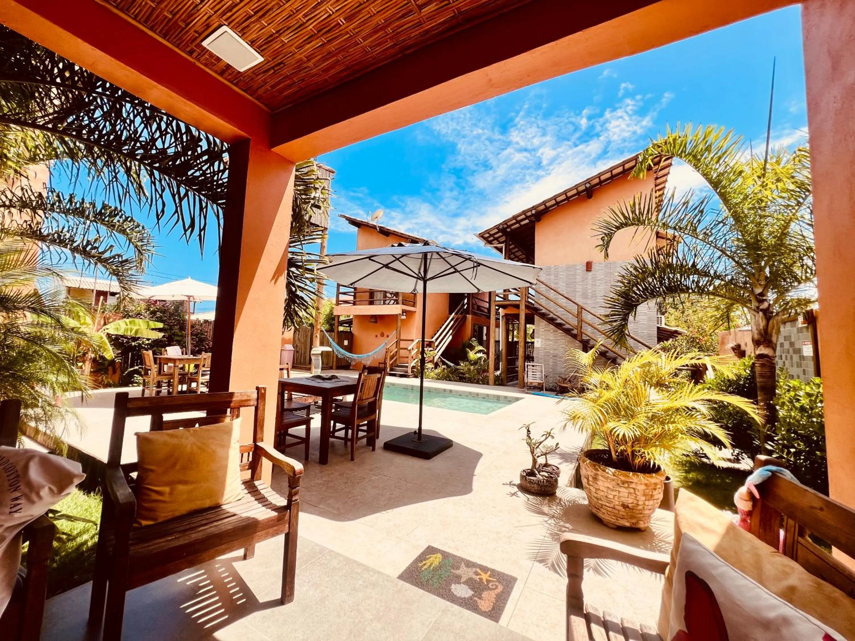 Communal lounge/ TV room in Pousada Vila dos Corais - Taipu de Fora