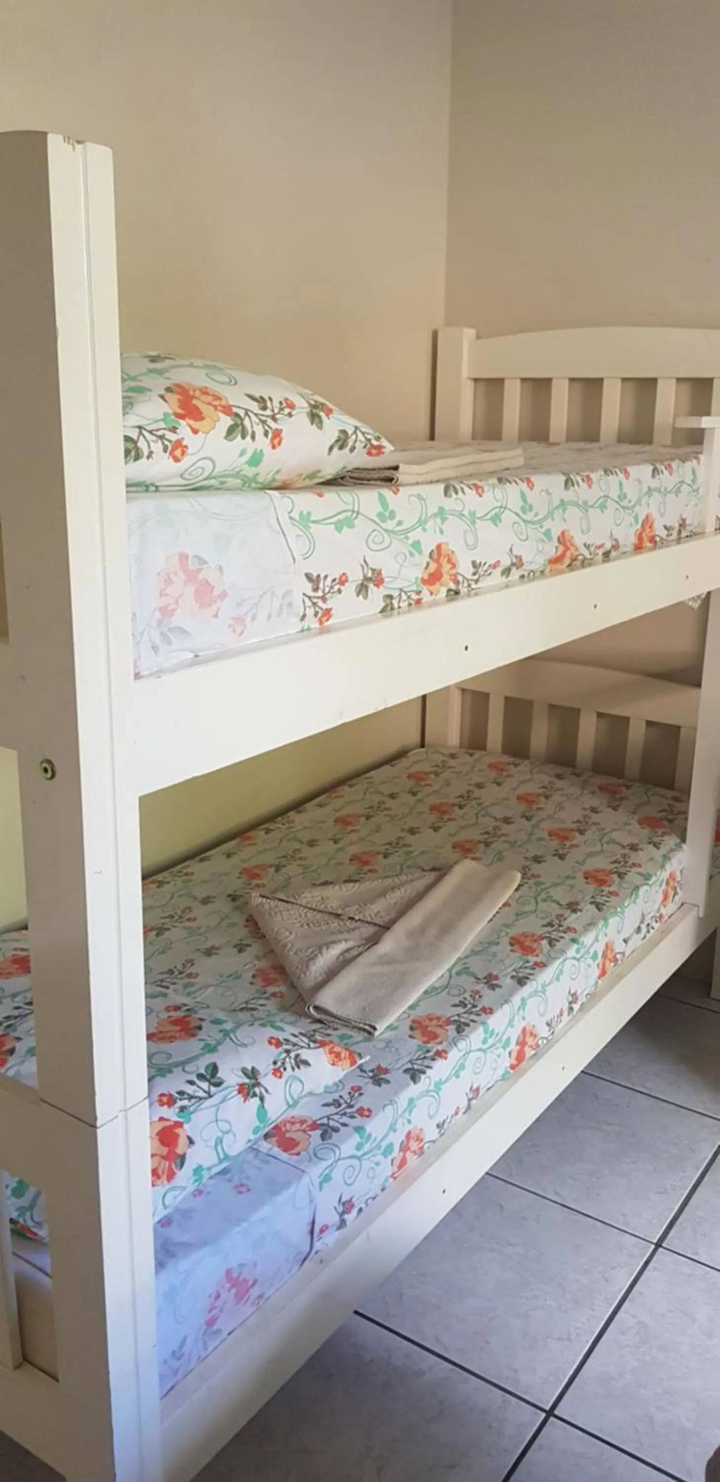 Bed in Pousada Guaruja