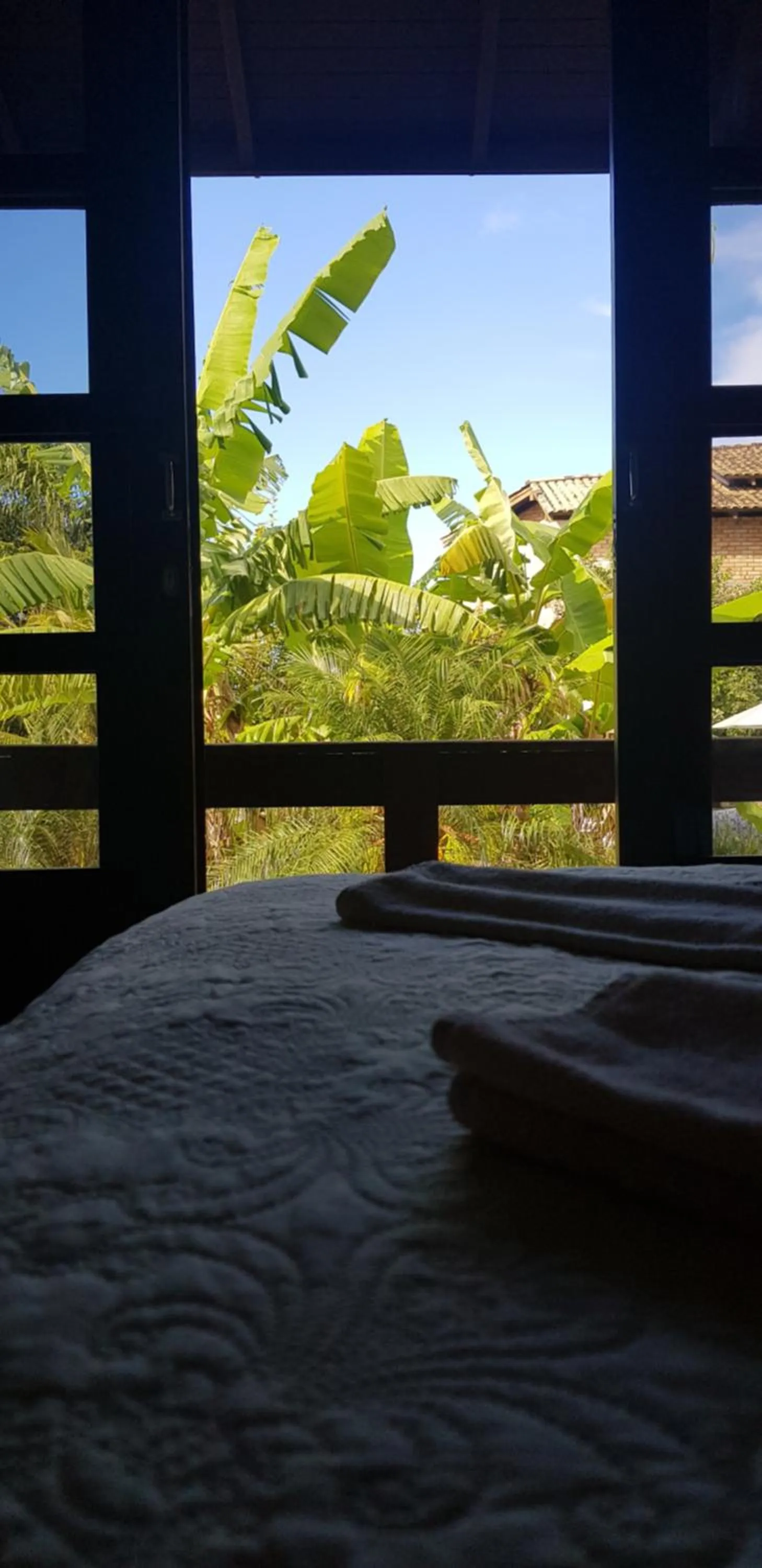 Bed in Pousada Guaruja