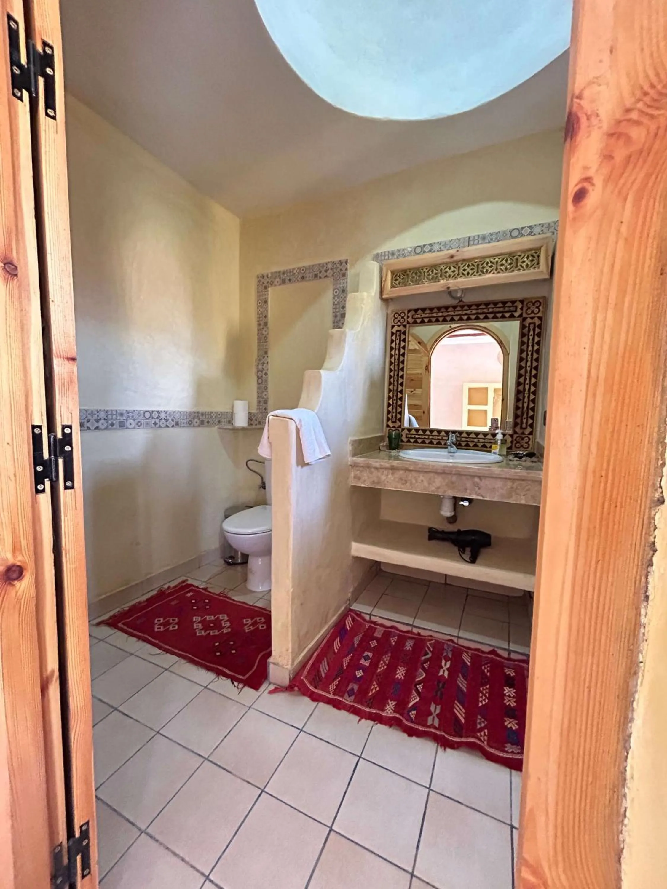Toilet in Oasis Tilogui-Luxury Hotel Restaurant and Desert Excursions In Zagora