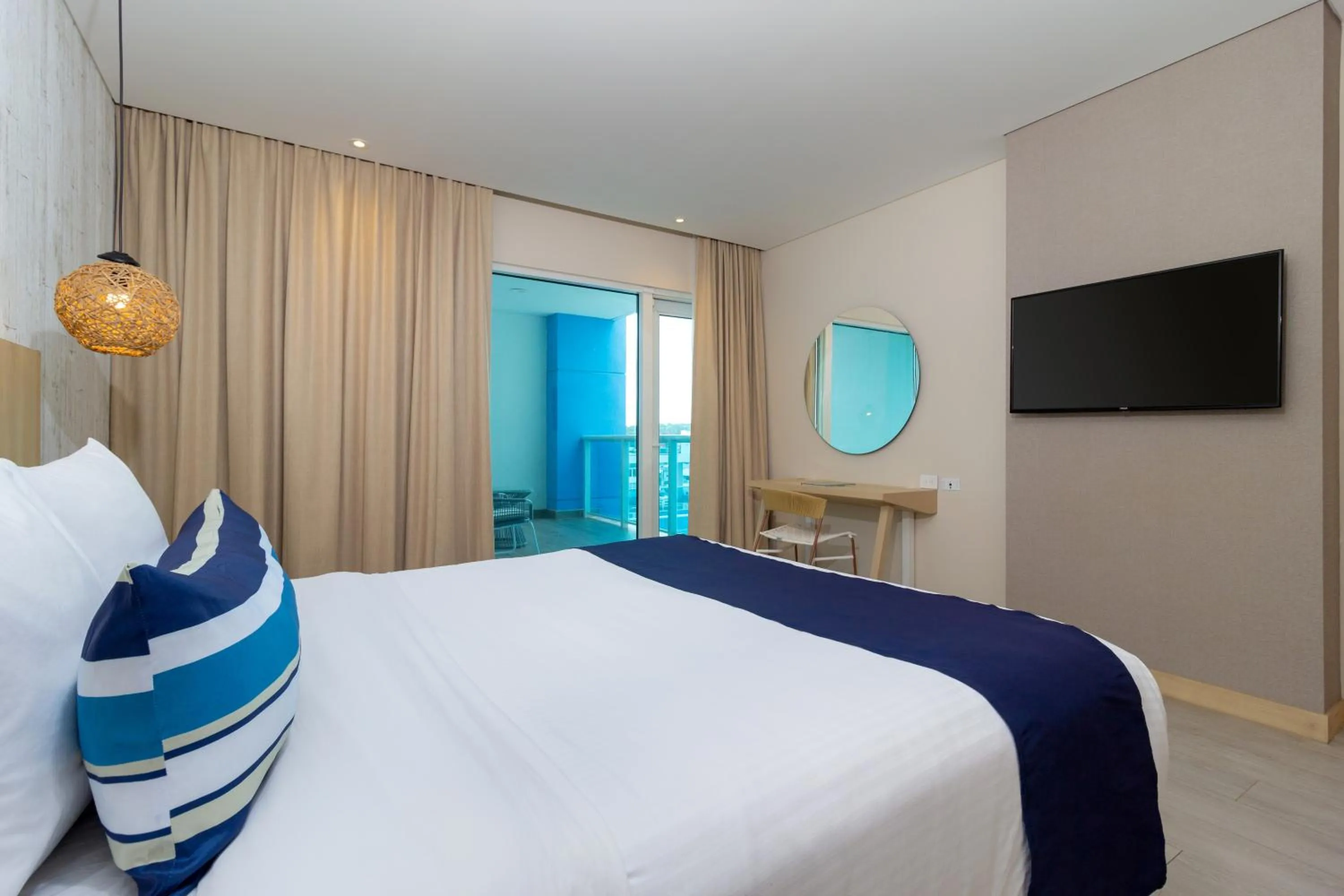 Bedroom, Bed in Aquamare Hotel