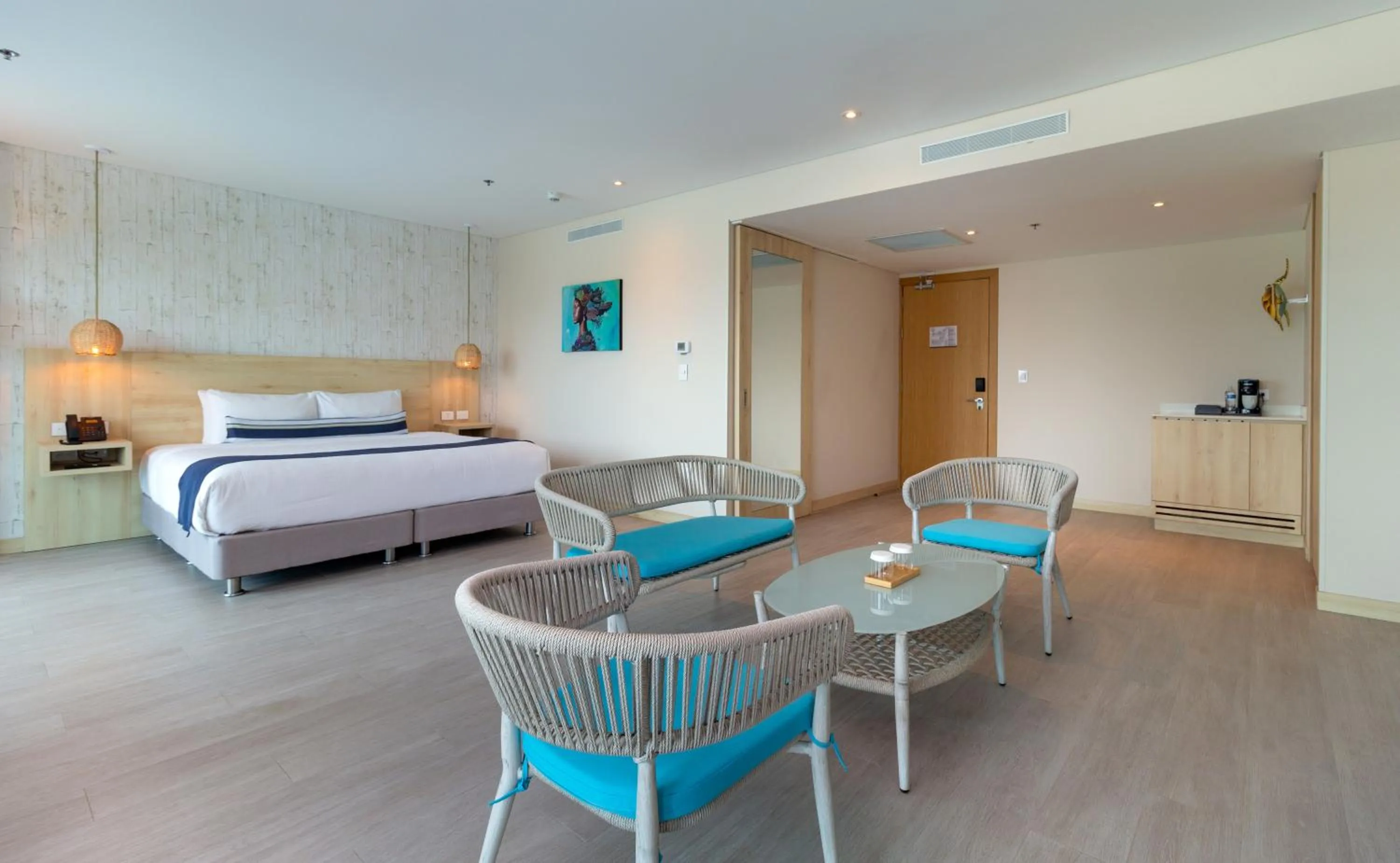 Living room, Bed in Aquamare Hotel