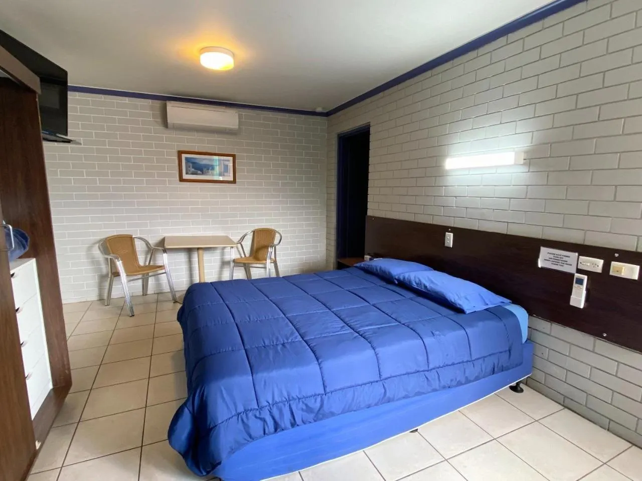 Bed in Grand Hotel Motel