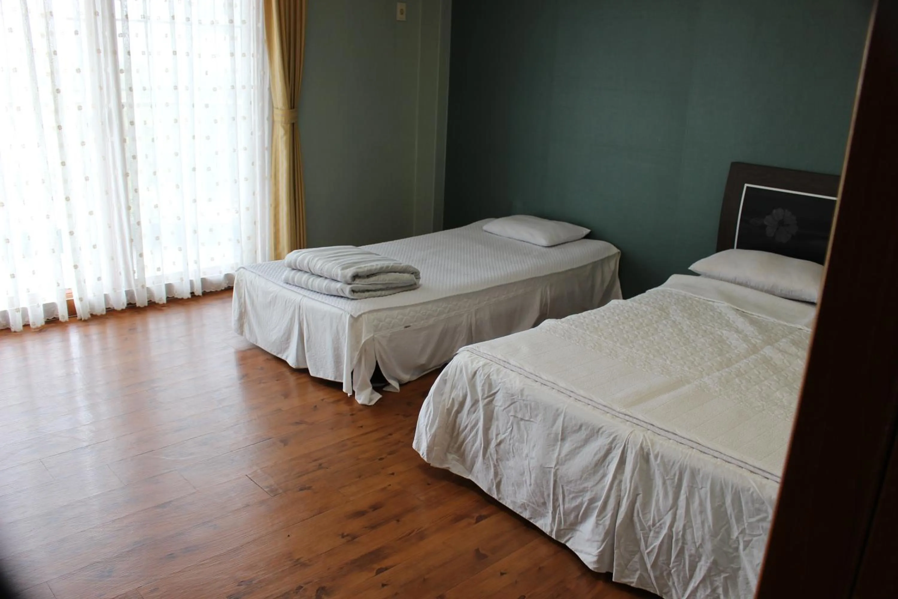 Bedroom, Bed in Jeju Feel House