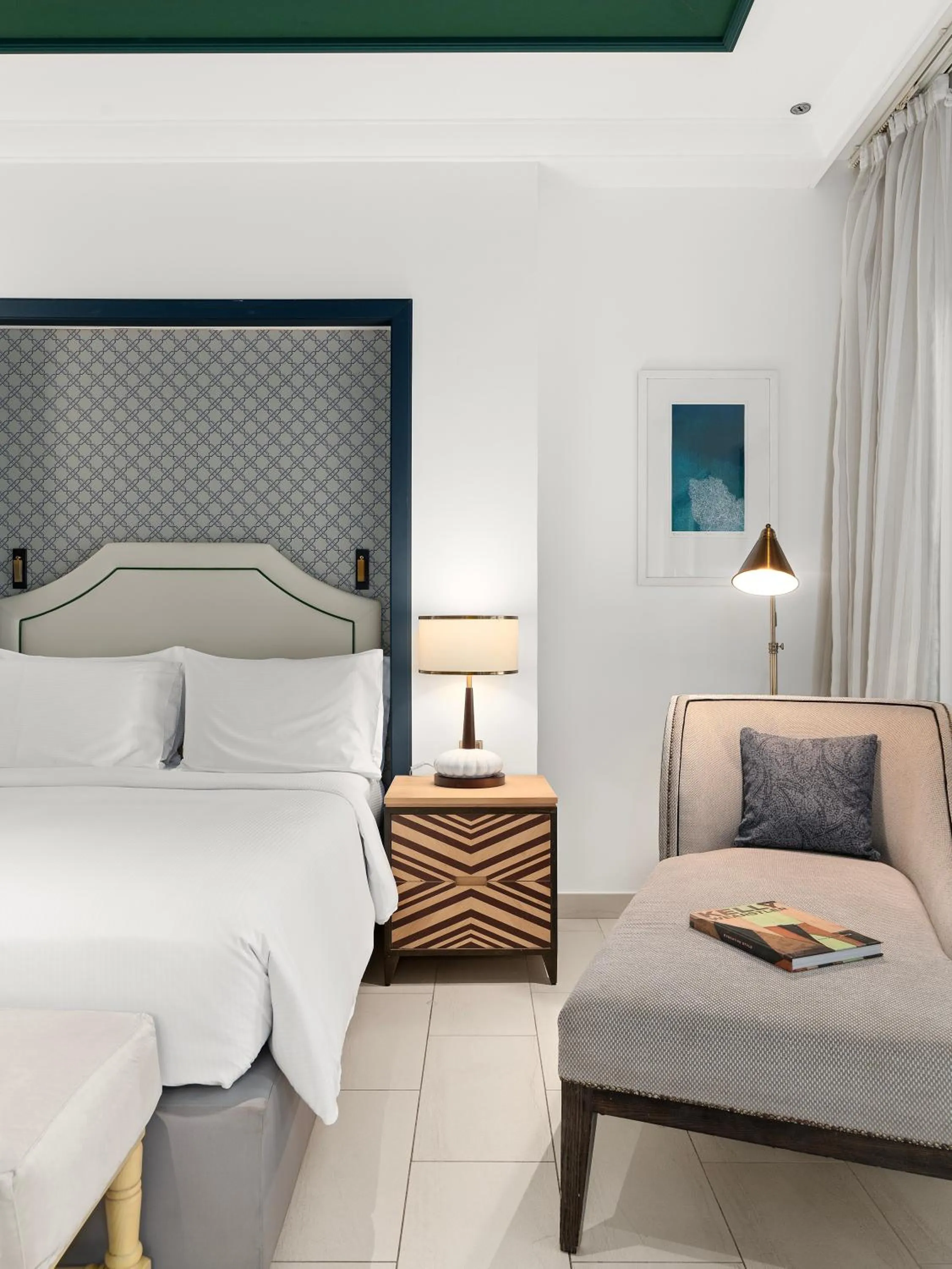 Seating area, Bed in Hilton Ras Al Khaimah Beach Resort