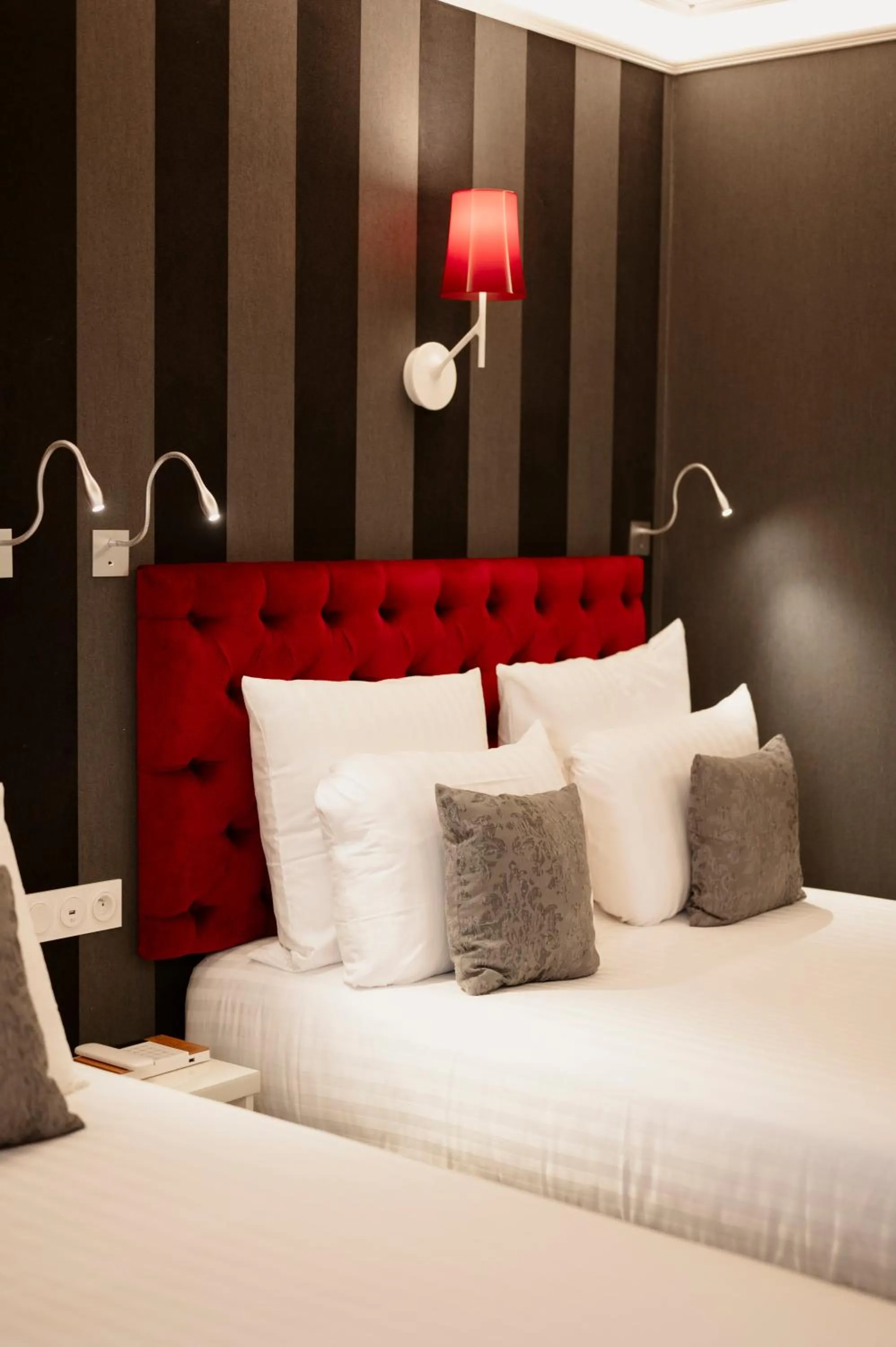 Bed in Hotel Dali Val d'Europe, Tapestry Collection by Hilton