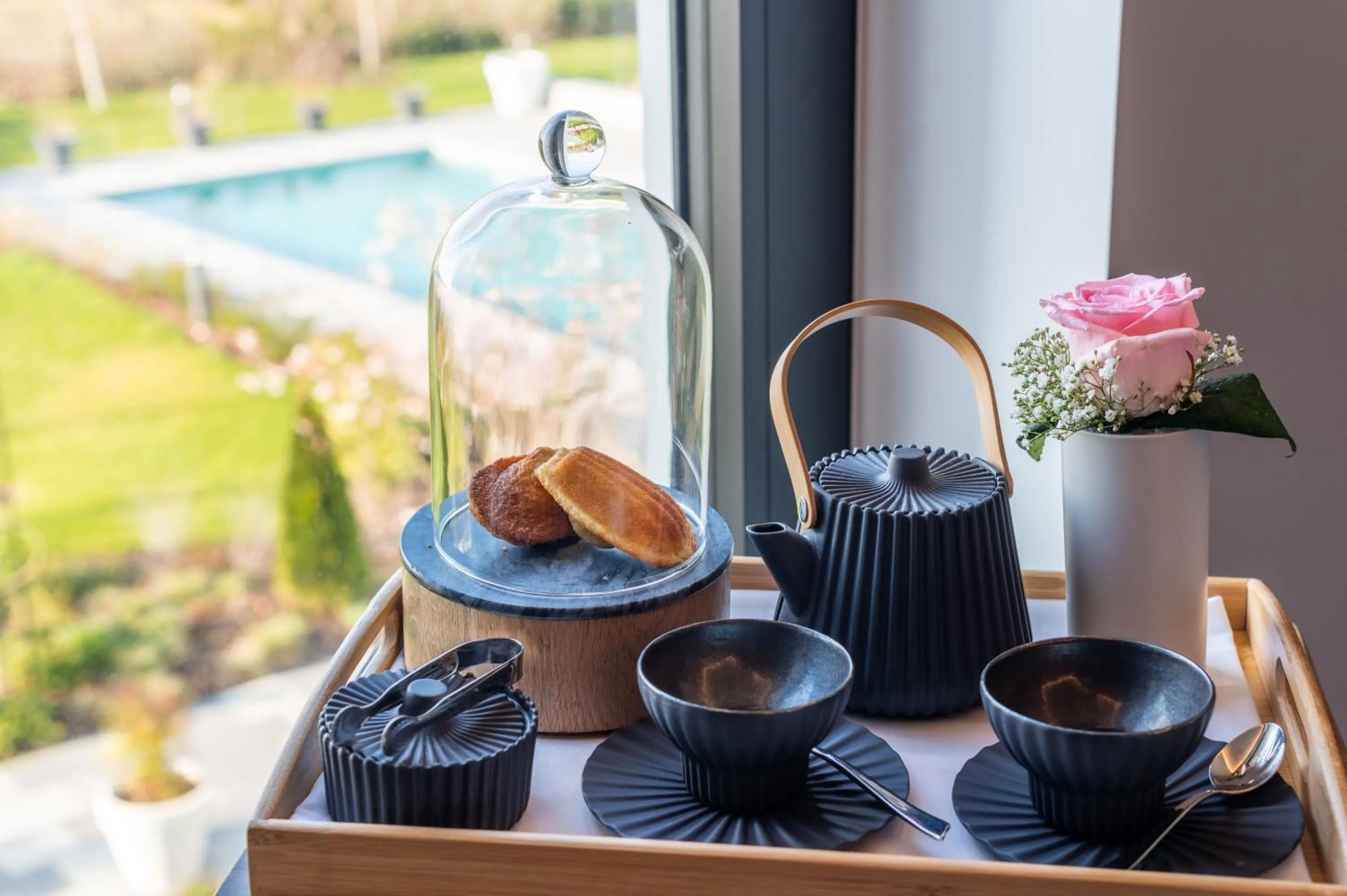 Pool view in Hotel Dali Val d'Europe, Tapestry Collection by Hilton