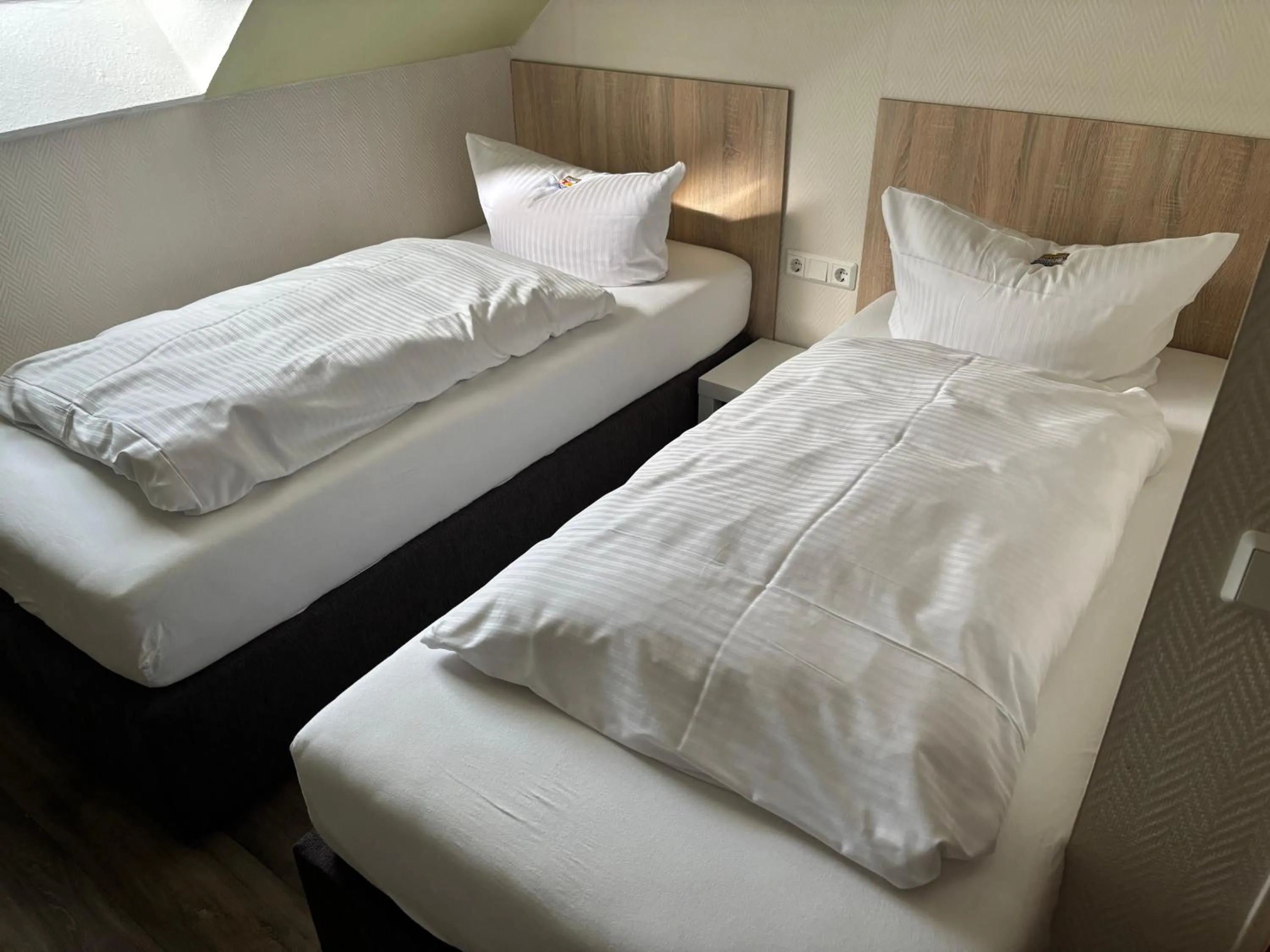 Photo of the whole room, Bed in REGIOHOTEL Pfälzer Hof Wernigerode - #Familienfreundlich #PreiswertÜbernachten #Harzurlaub #FreeParking