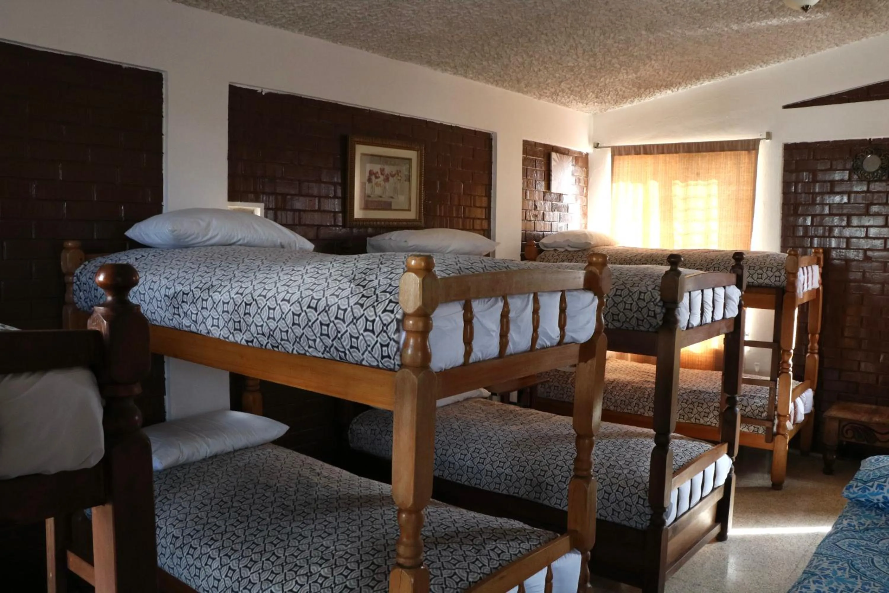 Bed in Hostal Los Volcanes