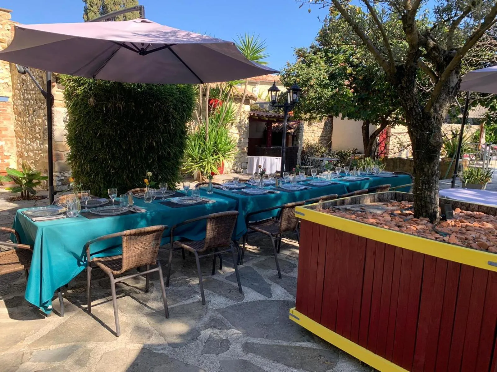 Patio in Logis Hotel Restaurant L'Esquielle