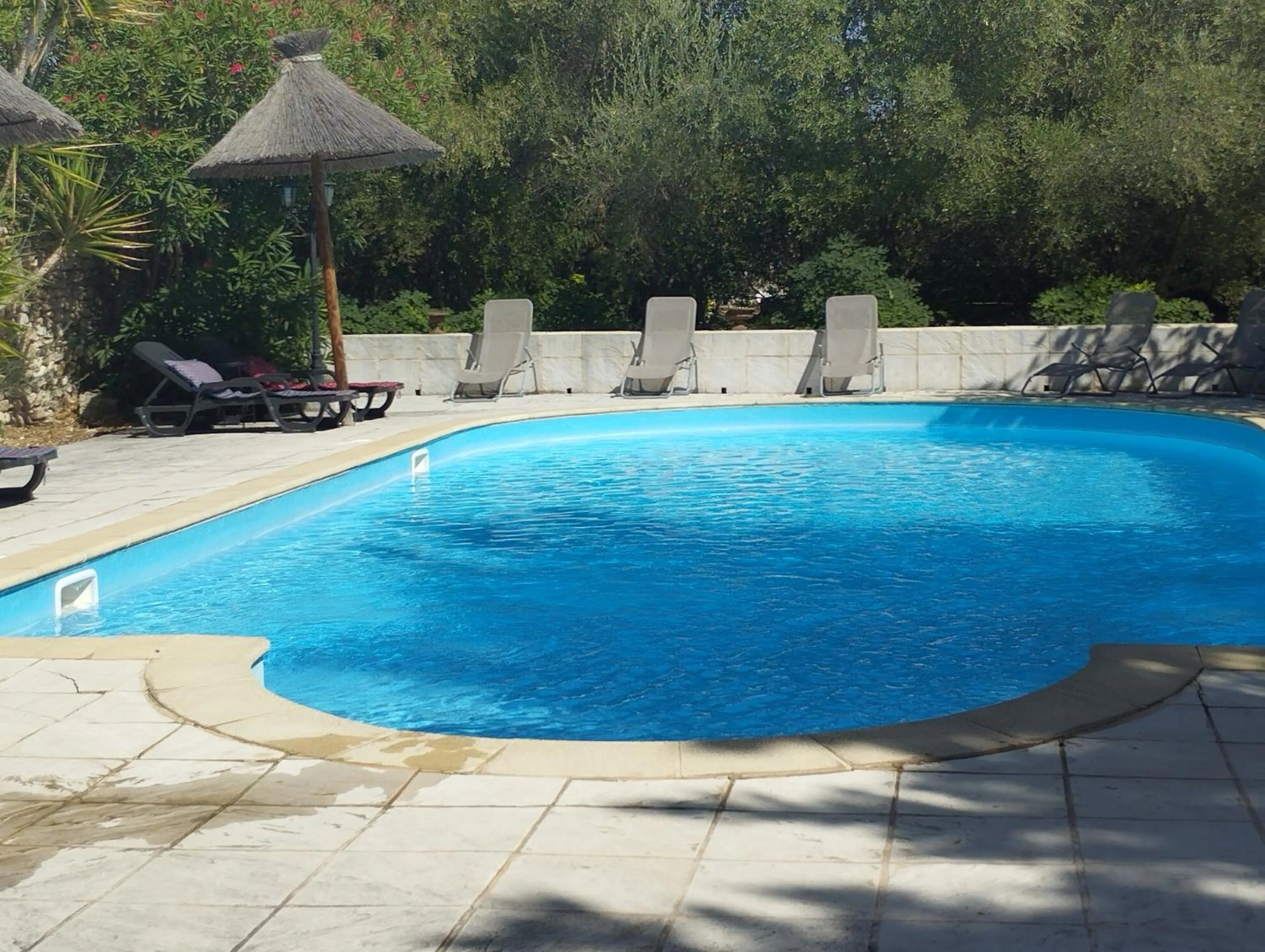 Swimming pool in Logis Hotel Restaurant L'Esquielle