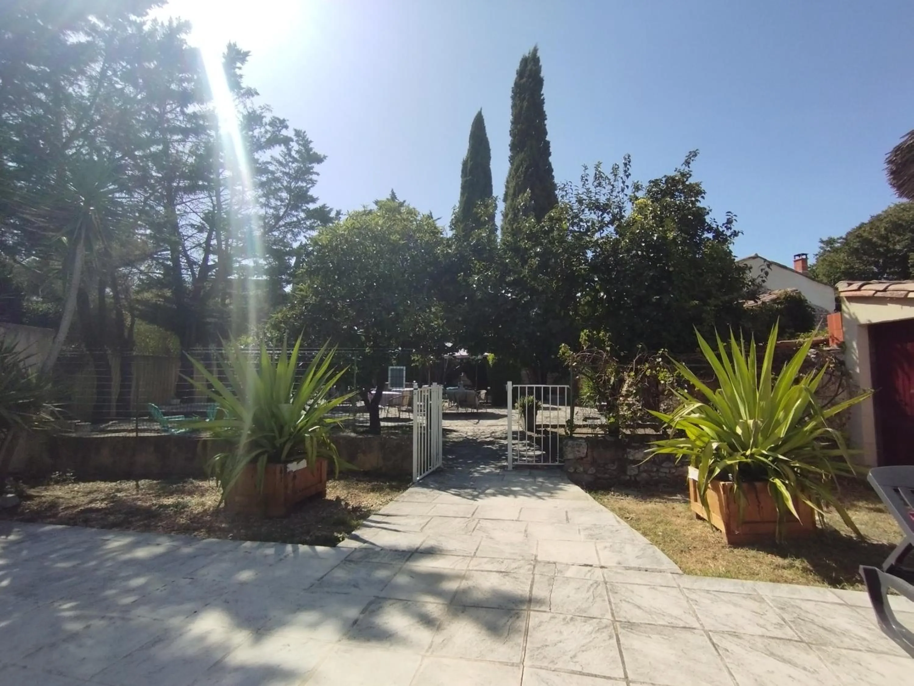 Garden in Logis Hotel Restaurant L'Esquielle