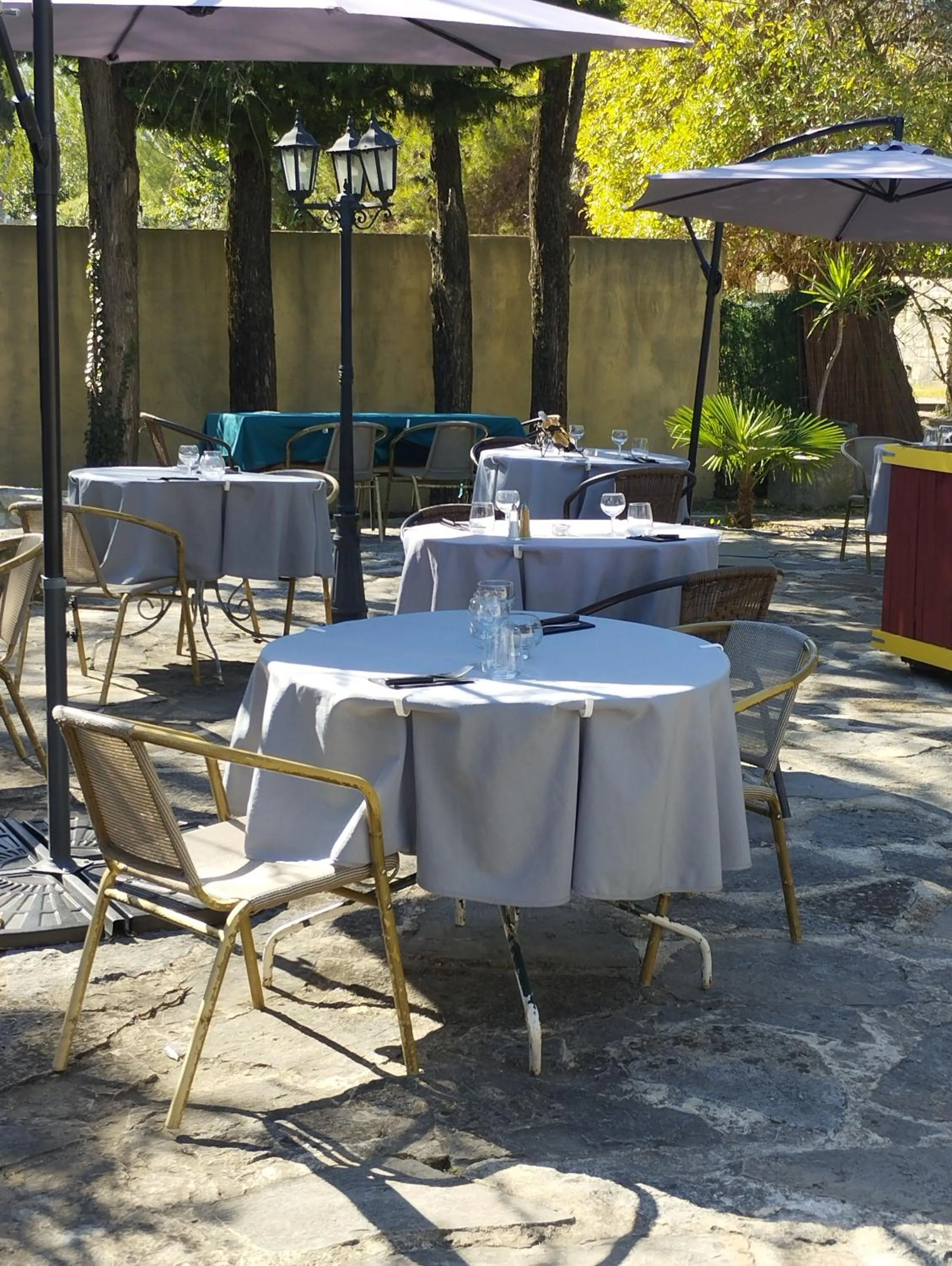 Patio in Logis Hotel Restaurant L'Esquielle