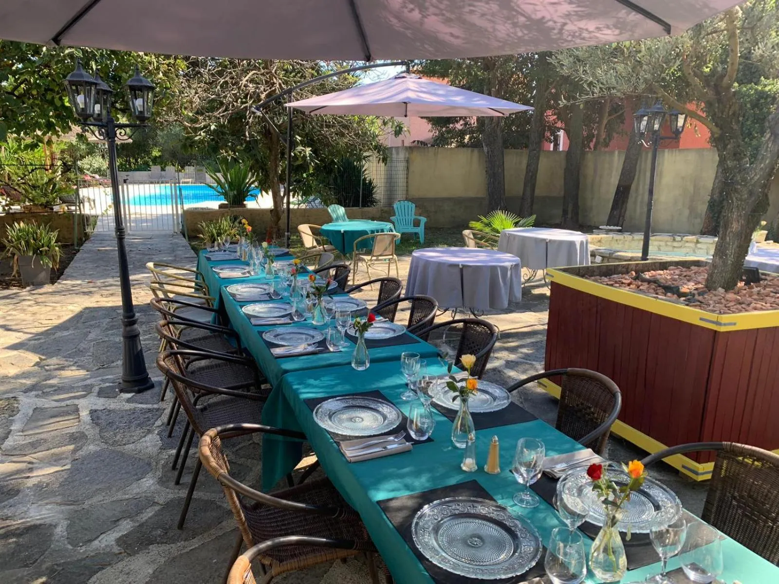 Patio in Logis Hotel Restaurant L'Esquielle