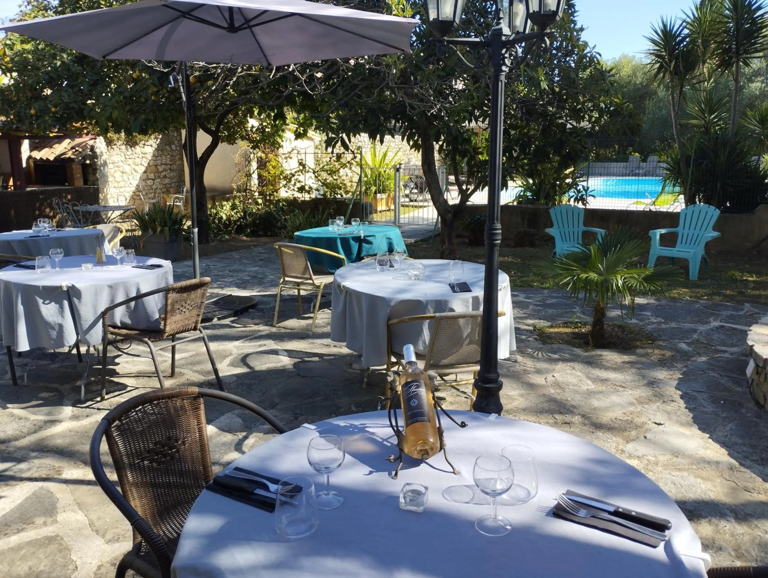 Patio in Logis Hotel Restaurant L'Esquielle