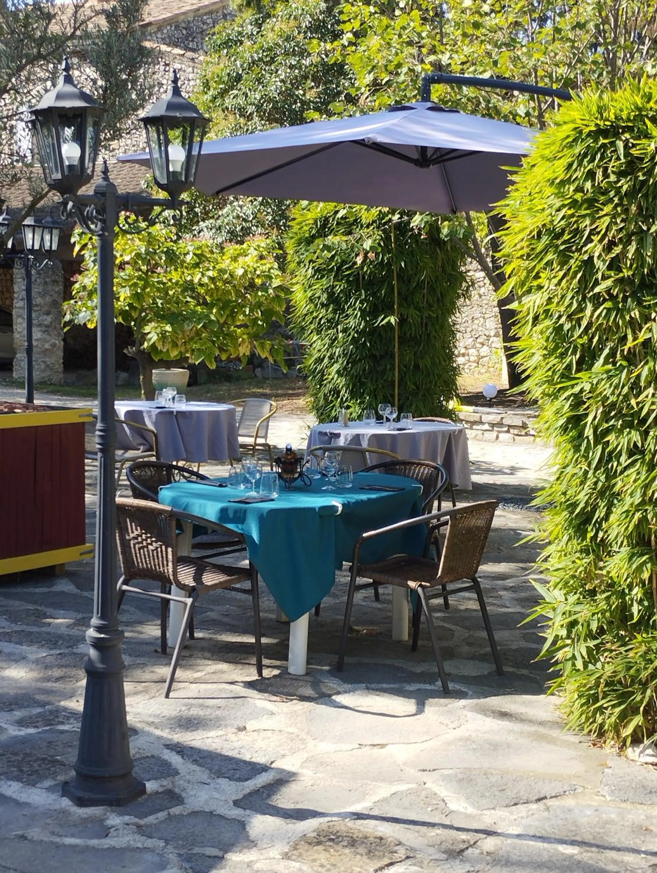 Patio in Logis Hotel Restaurant L'Esquielle