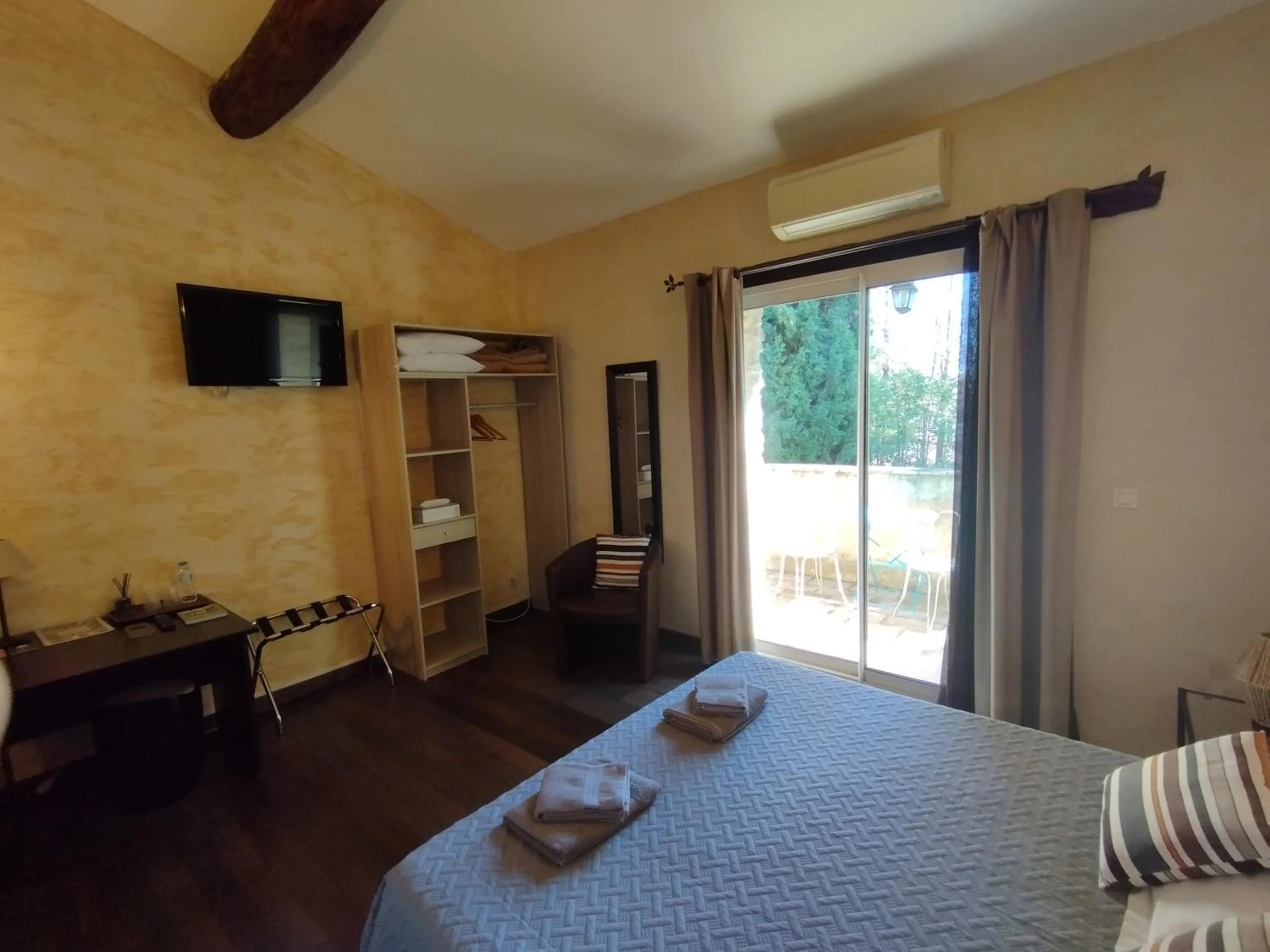 Photo of the whole room, Bed in Logis Hotel Restaurant L'Esquielle