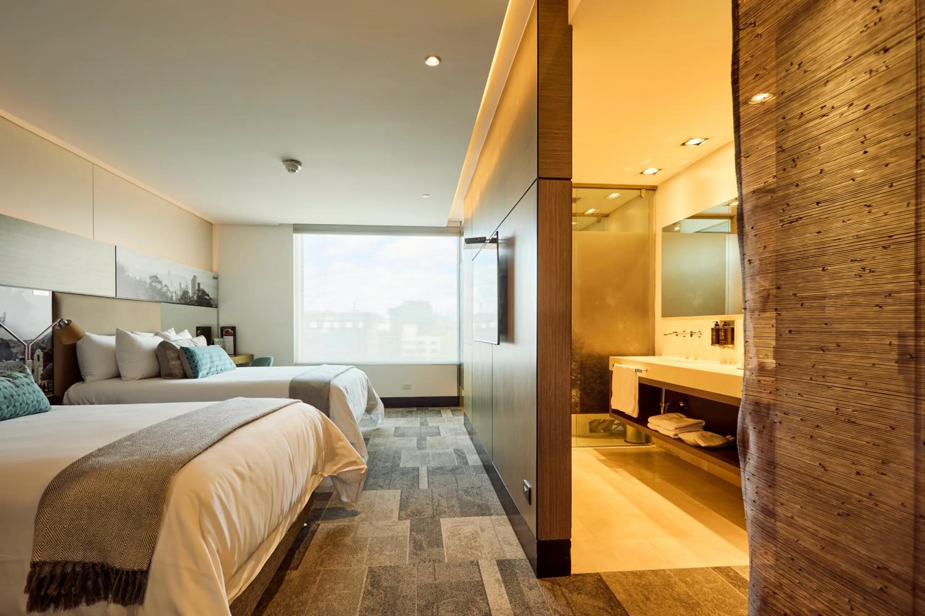 Bed in EK Hotel By Preferred Hotels Group