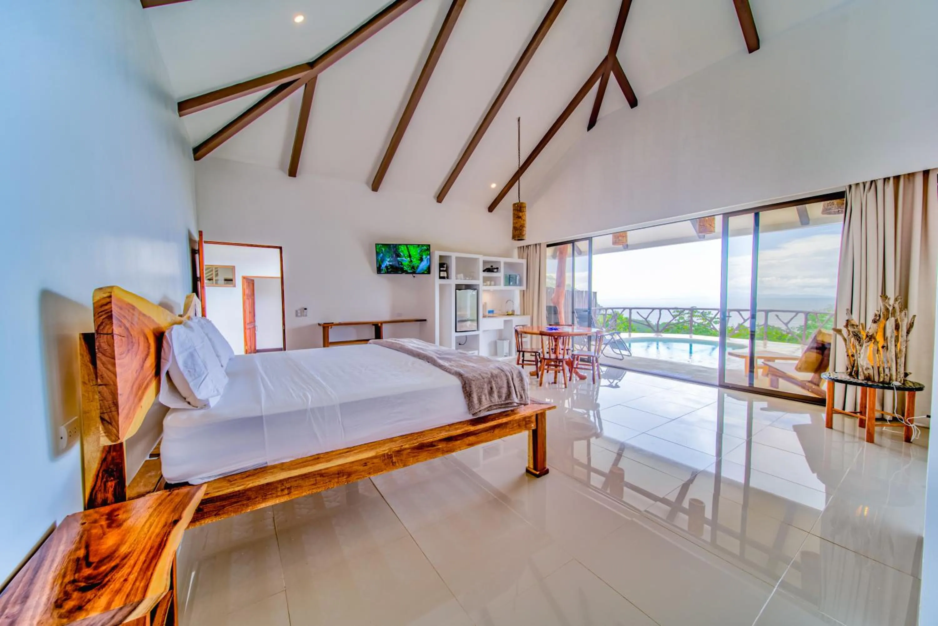 Photo of the whole room, Bed in Akua Suites Ocean View