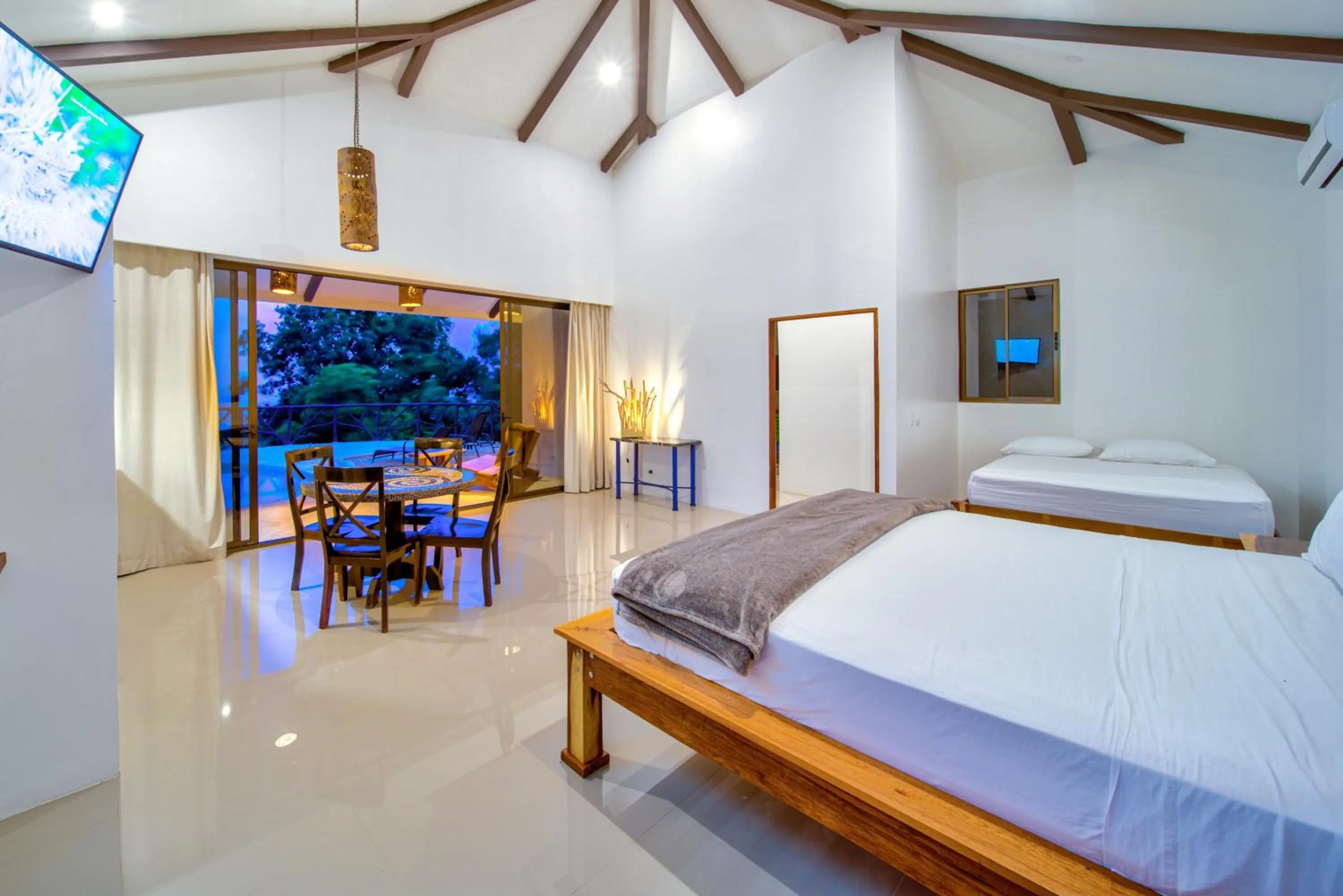 Photo of the whole room, Bed in Akua Suites Ocean View