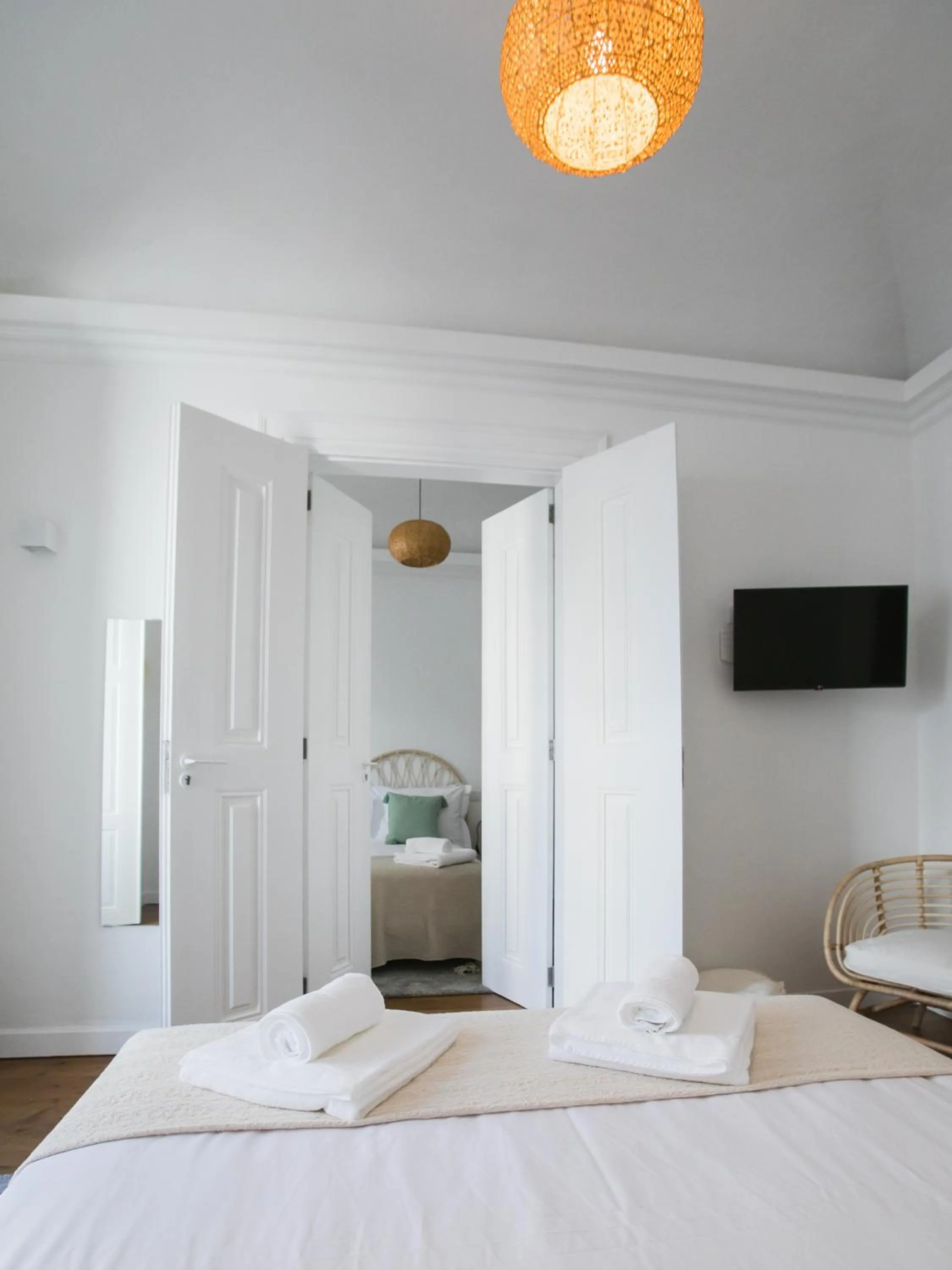 Bed in Casa Soure Suites and Apartments