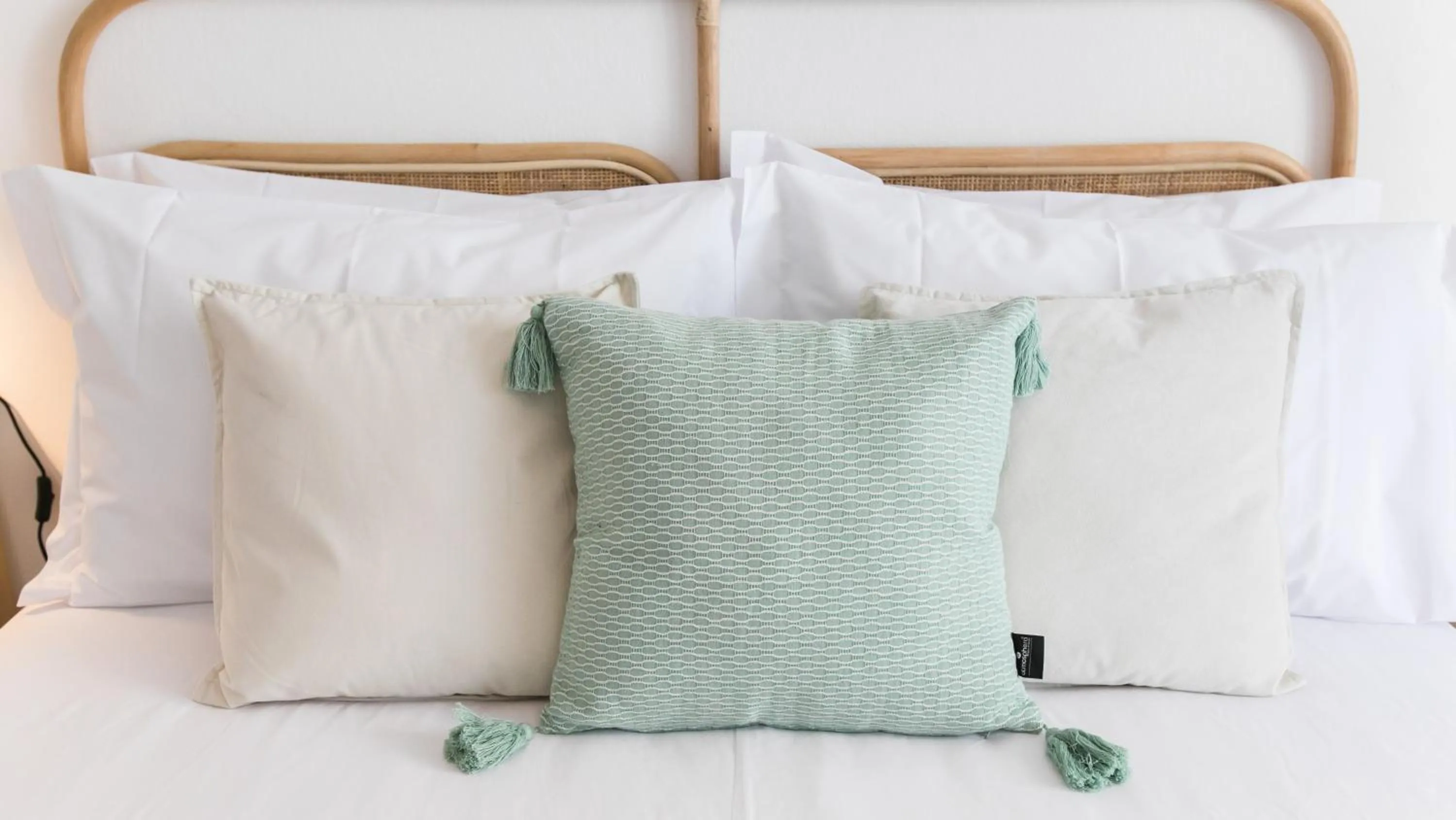 Bed in Casa Soure Suites and Apartments