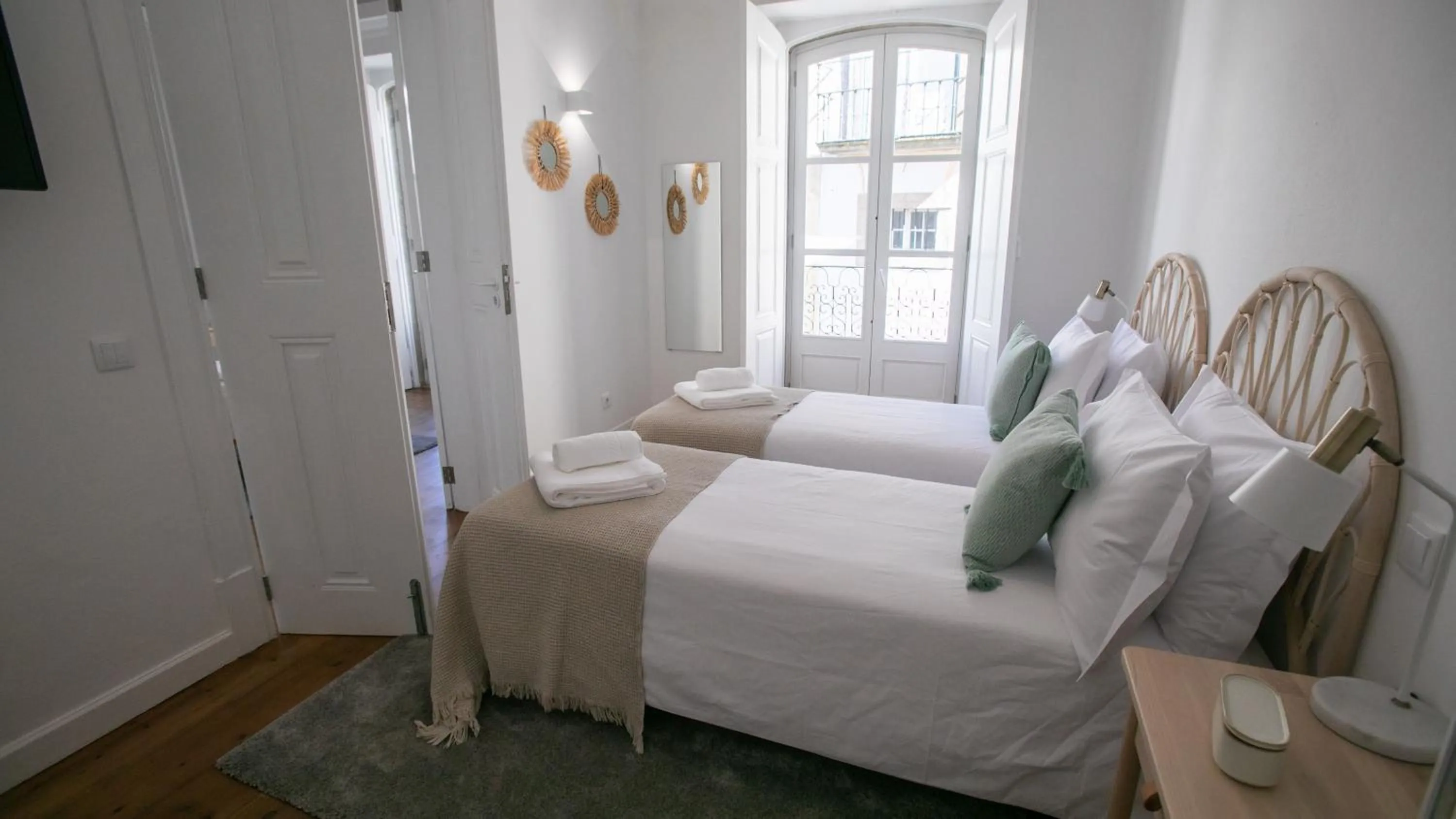 Bed in Casa Soure Suites and Apartments