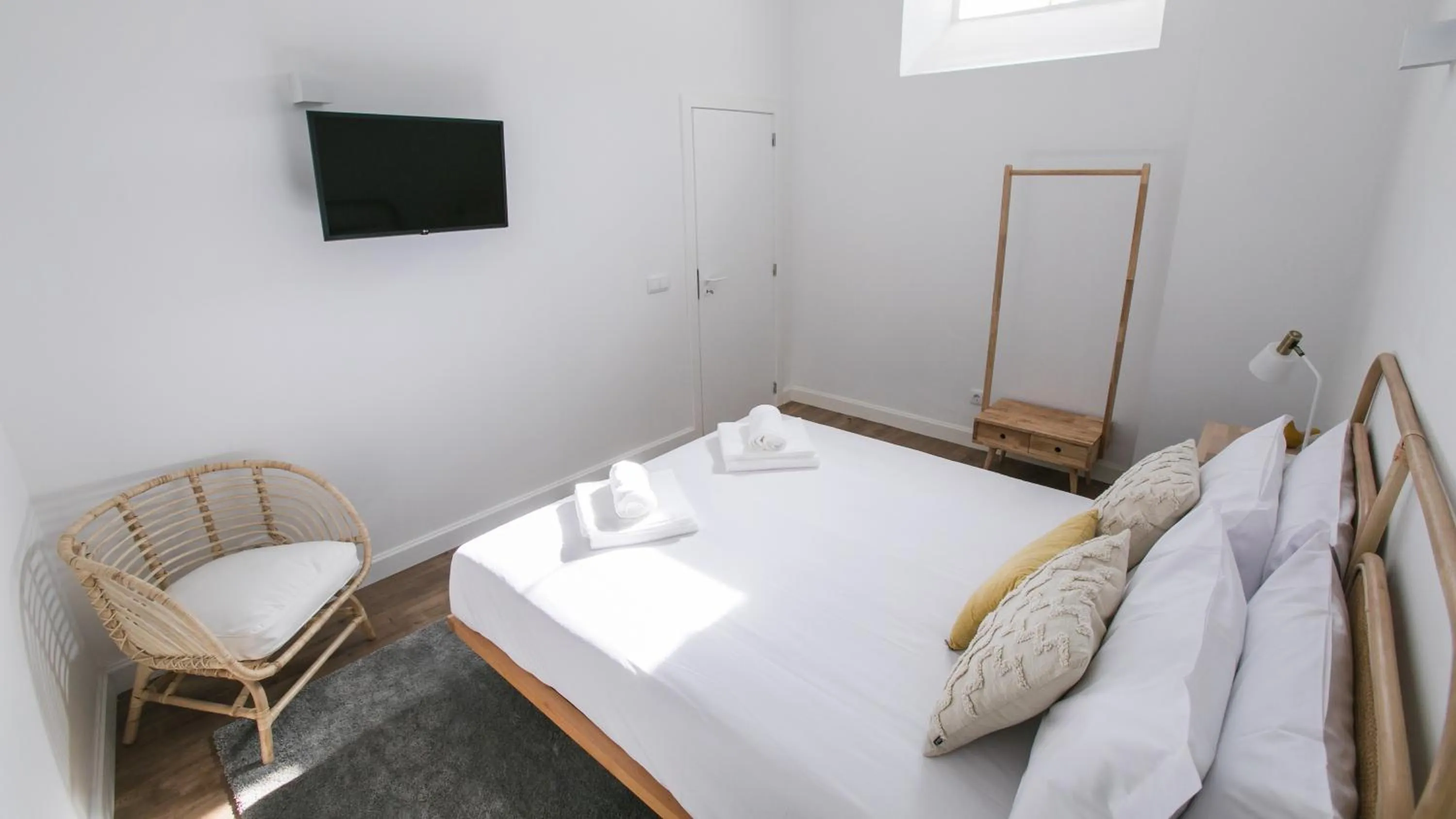 Bed in Casa Soure Suites and Apartments