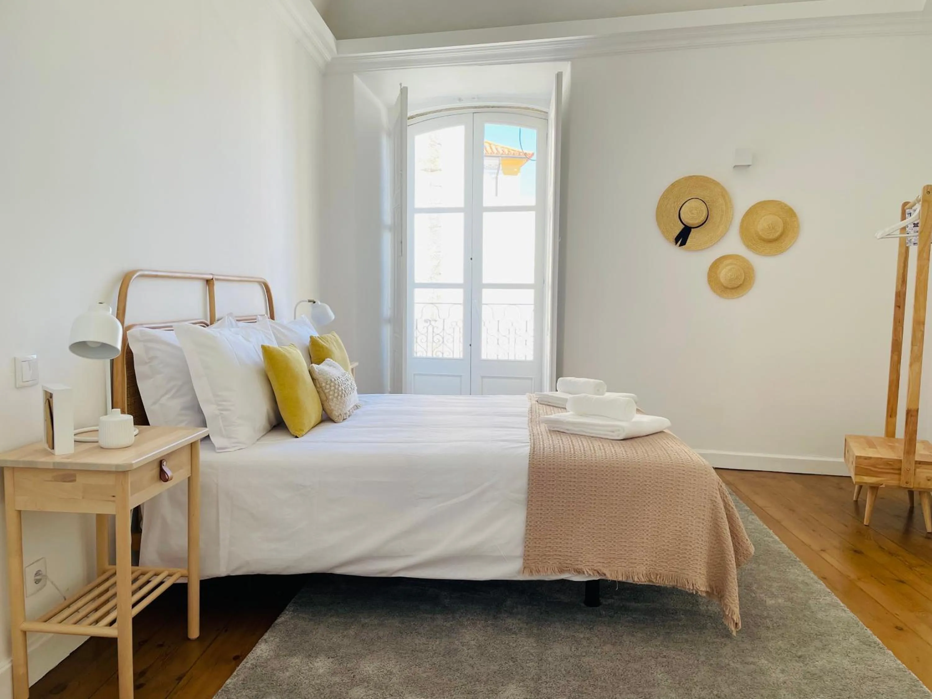 Bed in Casa Soure Suites and Apartments