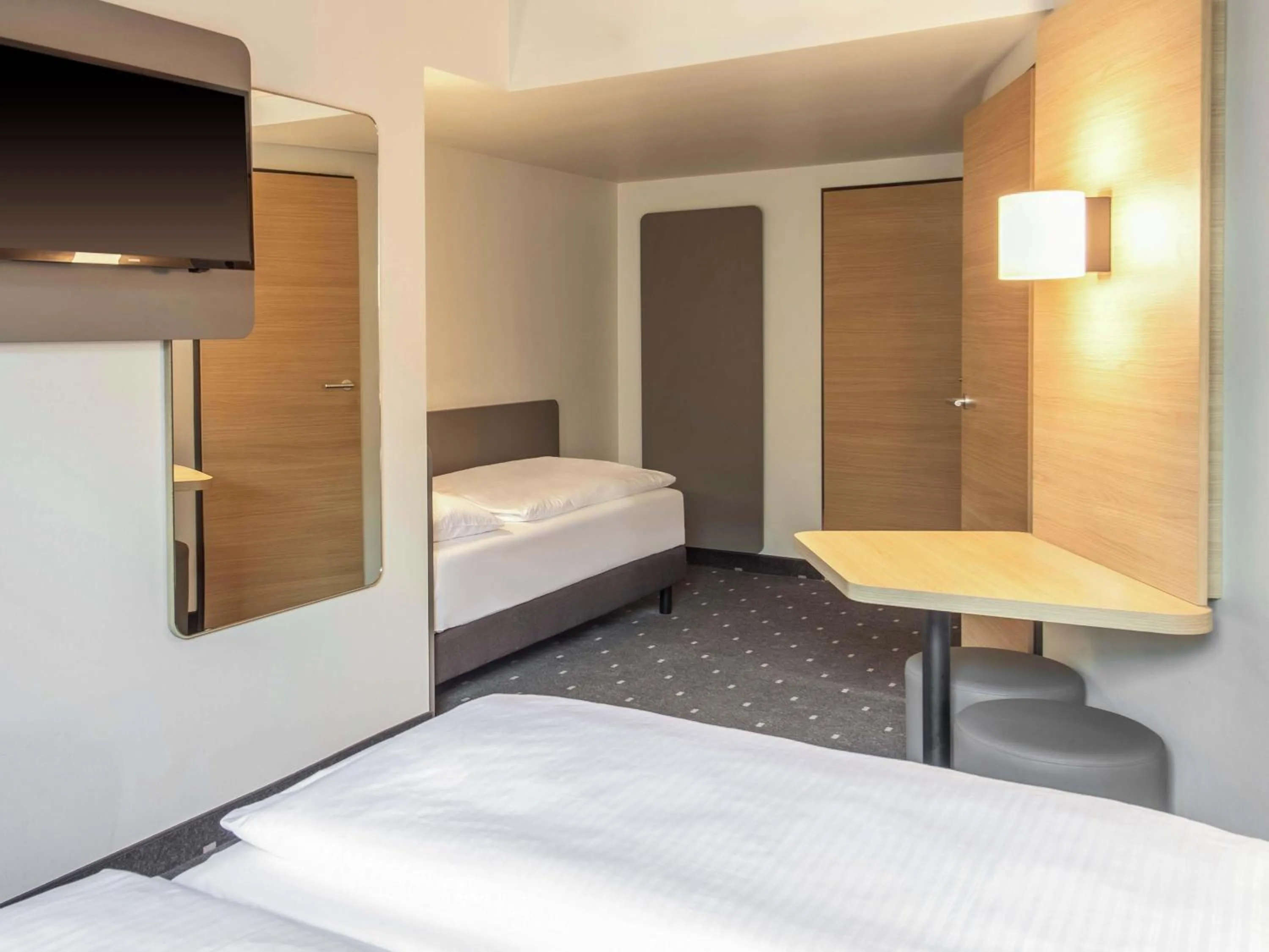 Photo of the whole room, Bed in B&B Hotel Nürnberg-Hbf