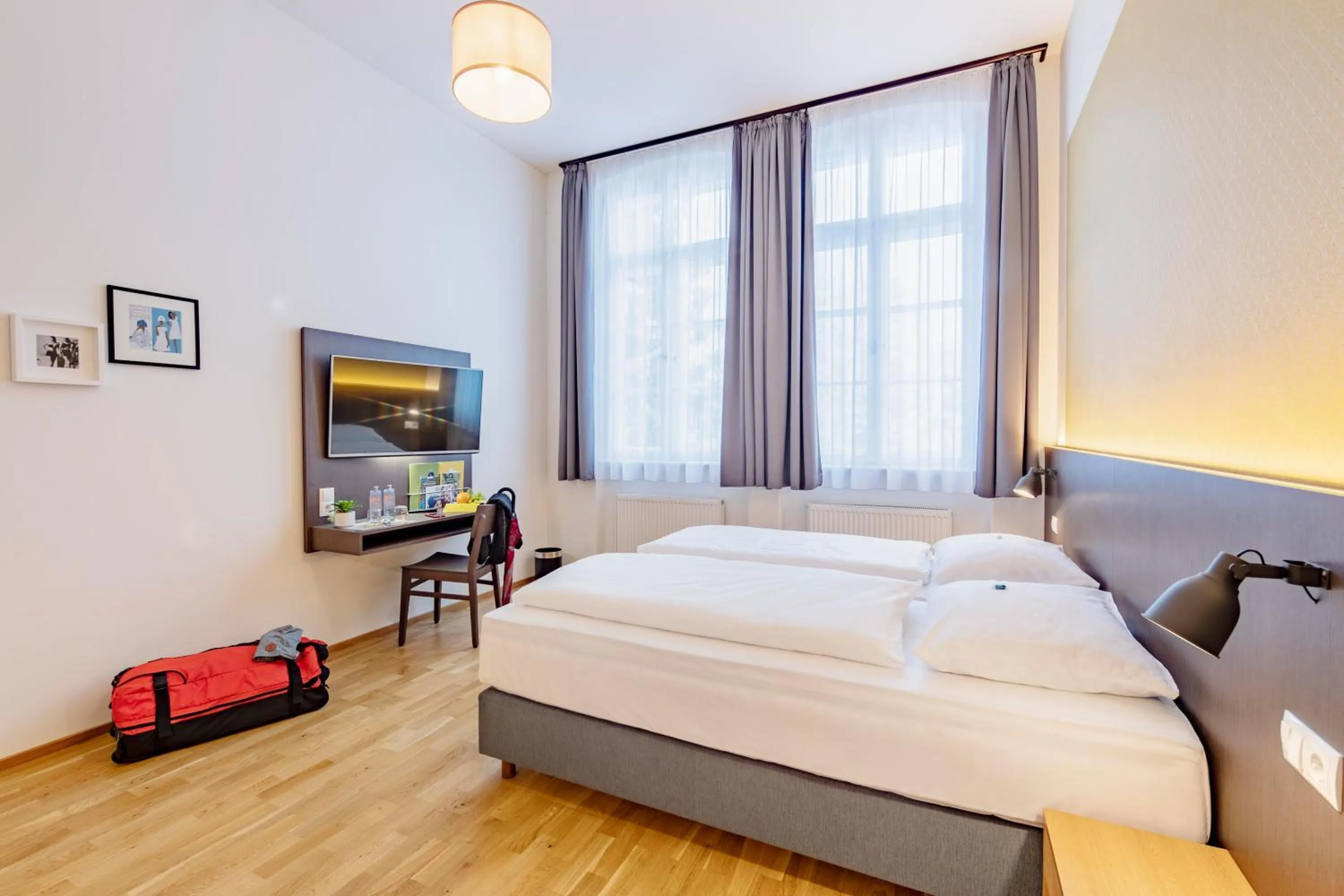 Photo of the whole room, Bed in JUFA Hotel Bregenz