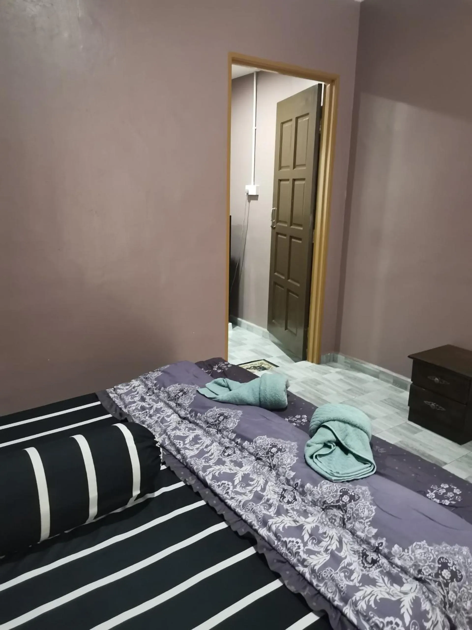 Bedroom in OYO Home 90348 Inspire Rooms