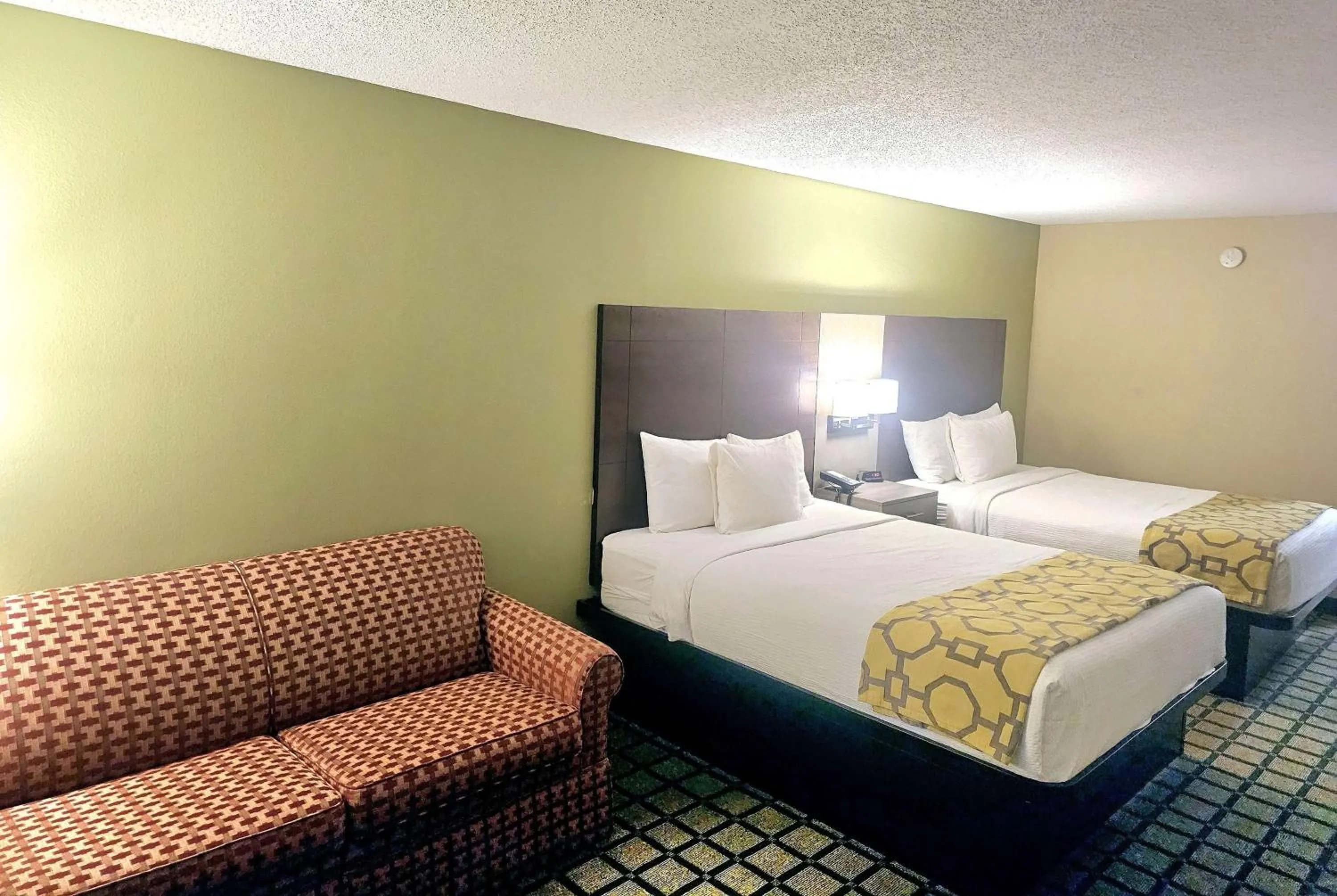 Photo of the whole room, Bed in Baymont by Wyndham Rolla