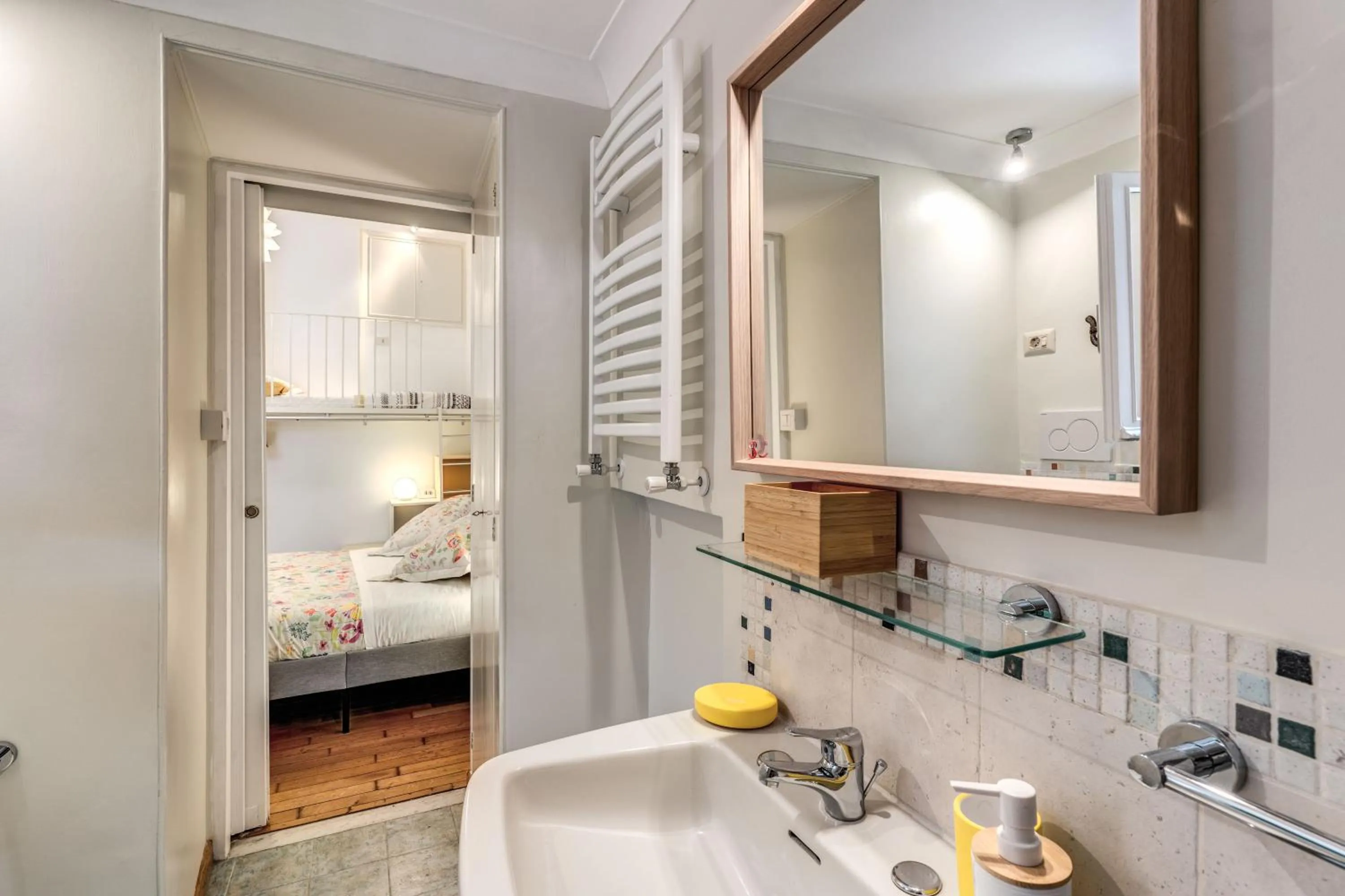 Bathroom, Bed in Elegant Apartment Behind the Colosseum