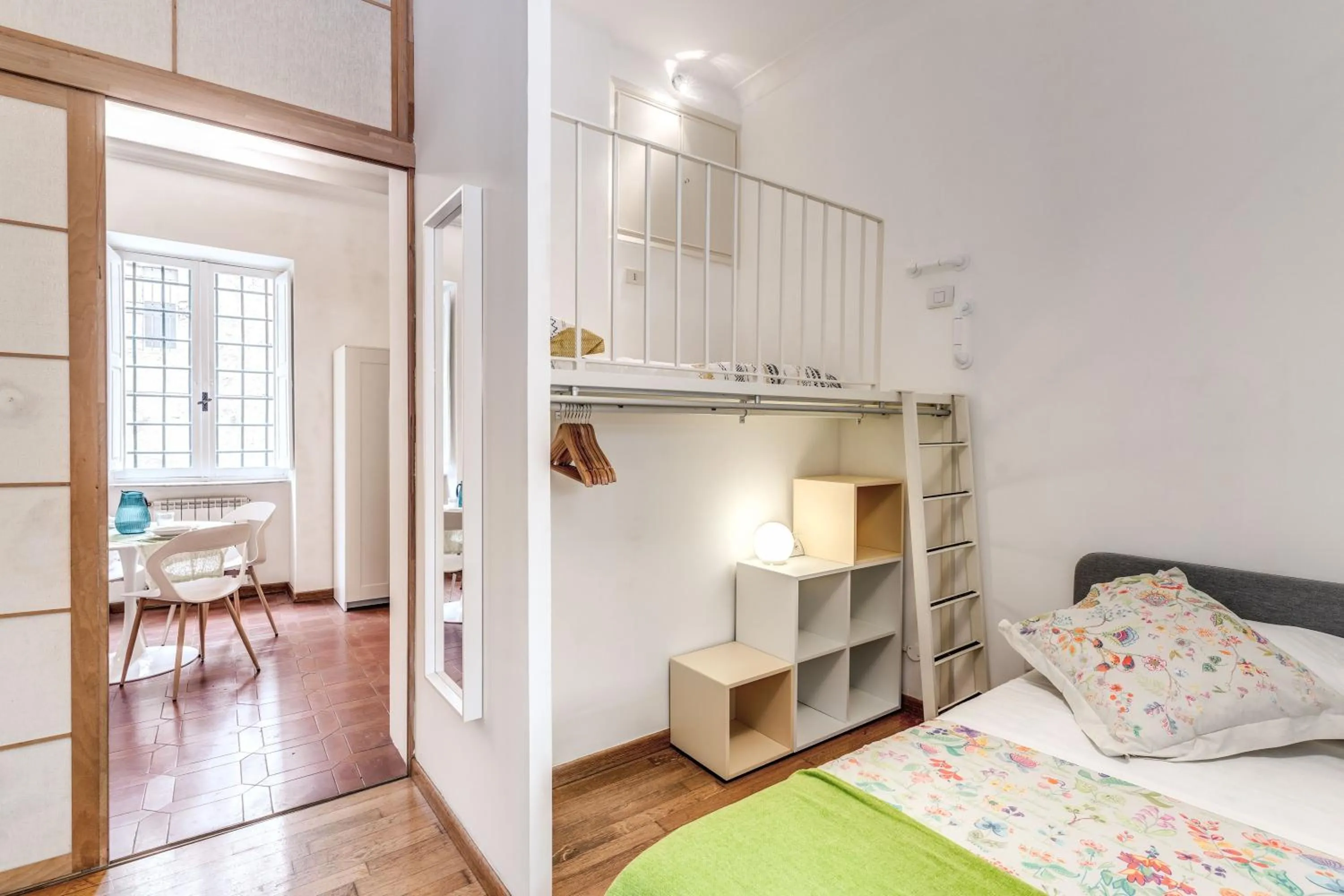Photo of the whole room, Bed in Elegant Apartment Behind the Colosseum