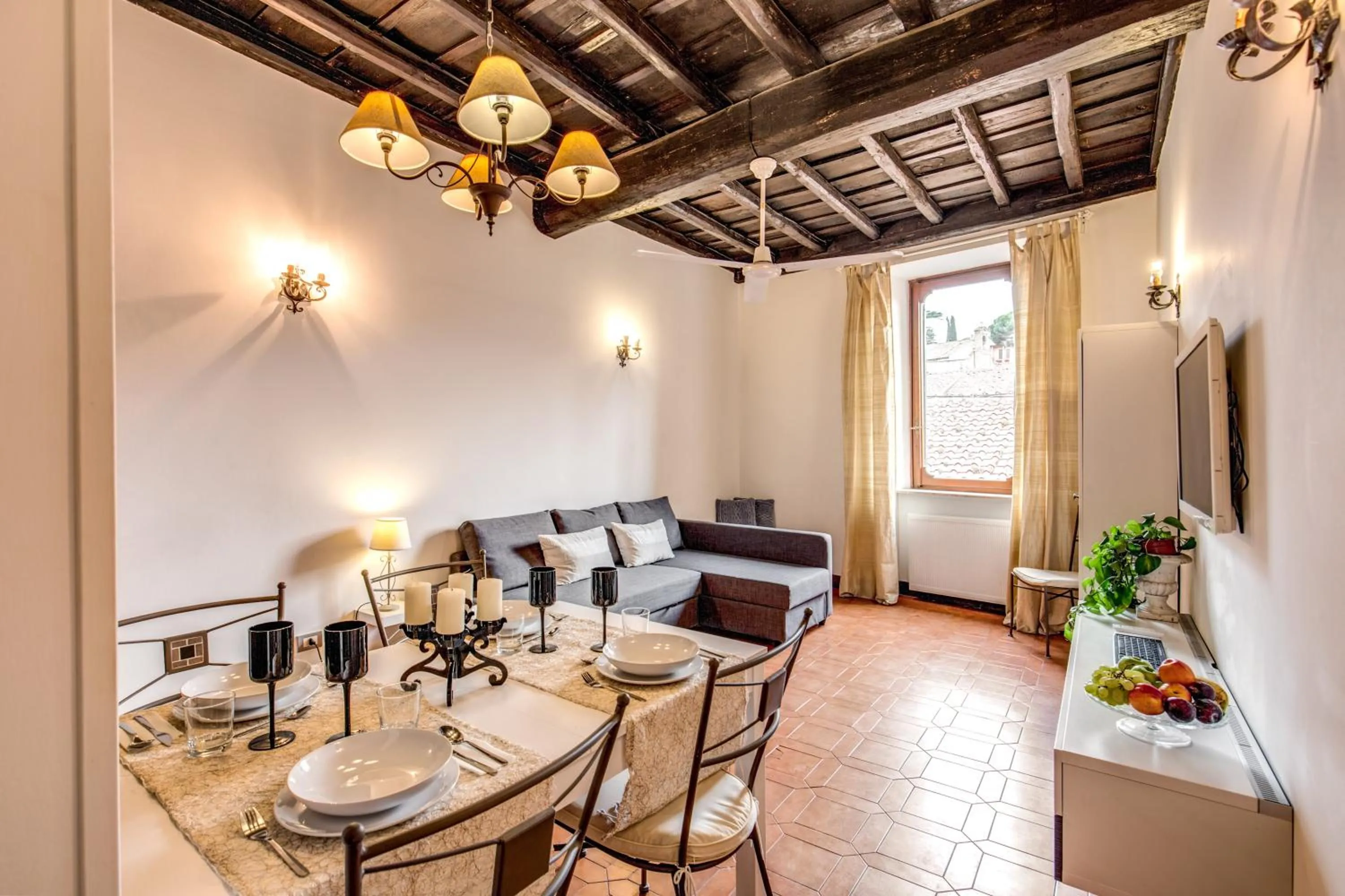 Seating area in Elegant Apartment Behind the Colosseum