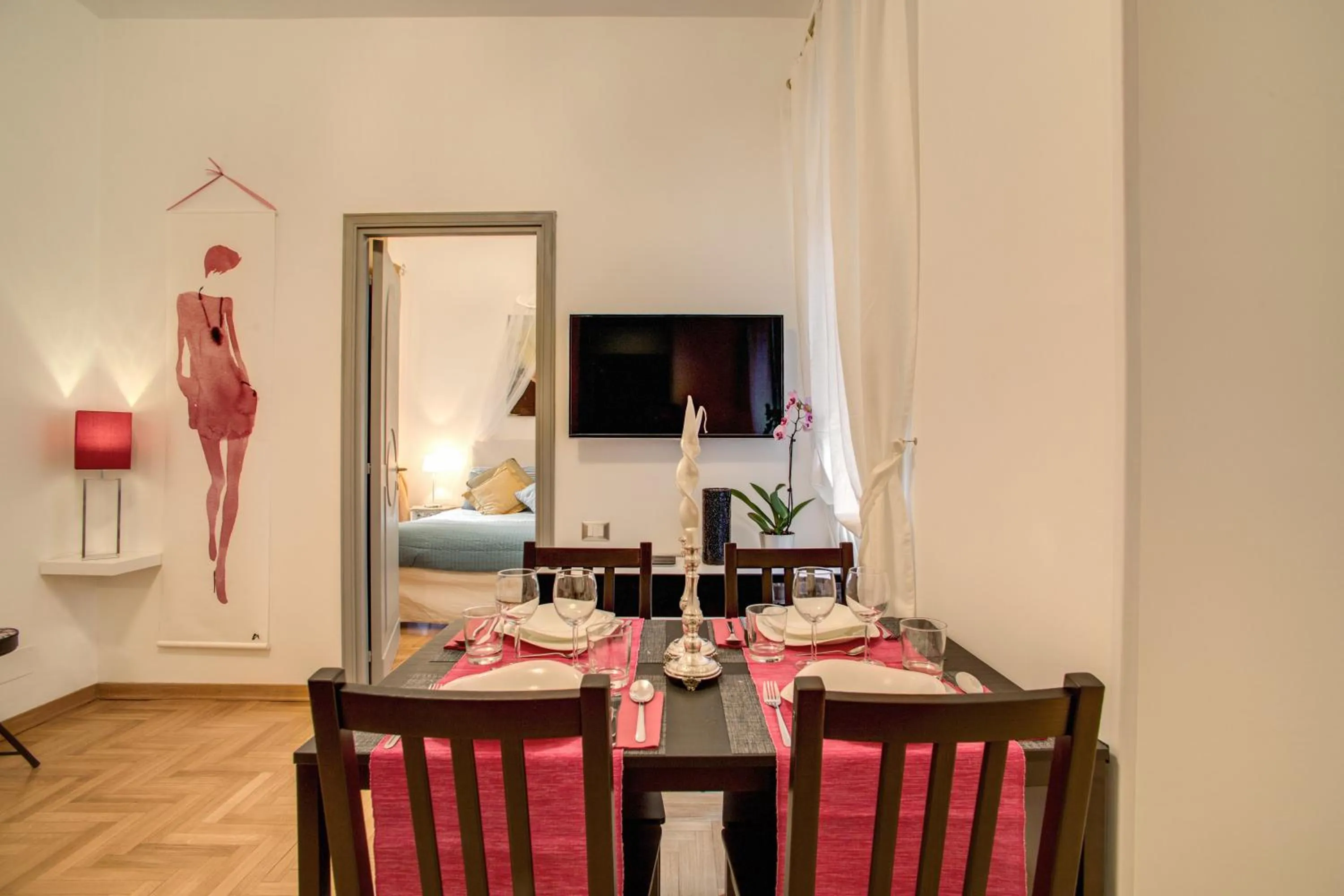 Dining area in Elegant Apartment Behind the Colosseum
