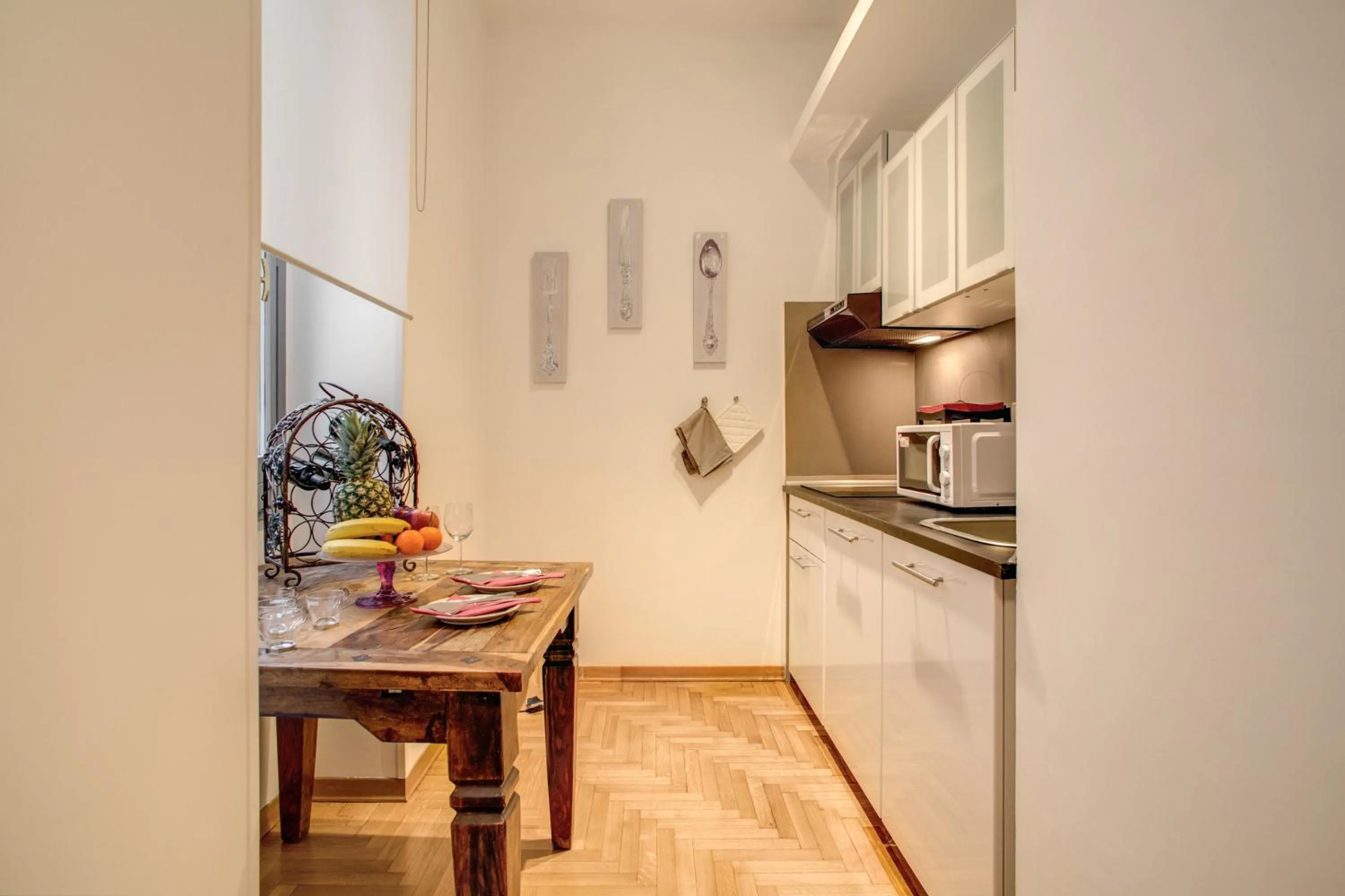 Kitchen or kitchenette in Elegant Apartment Behind the Colosseum