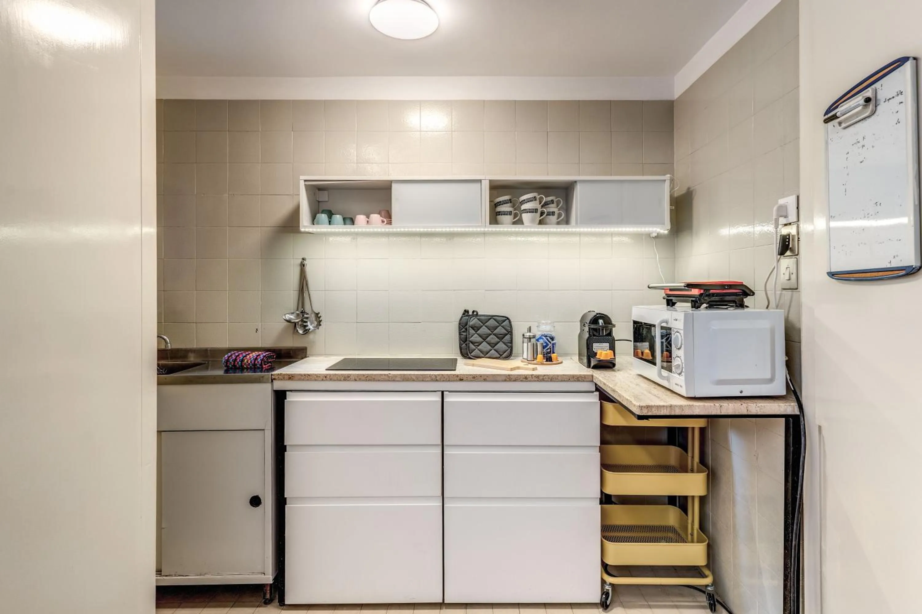 Kitchen or kitchenette in Elegant Apartment Behind the Colosseum
