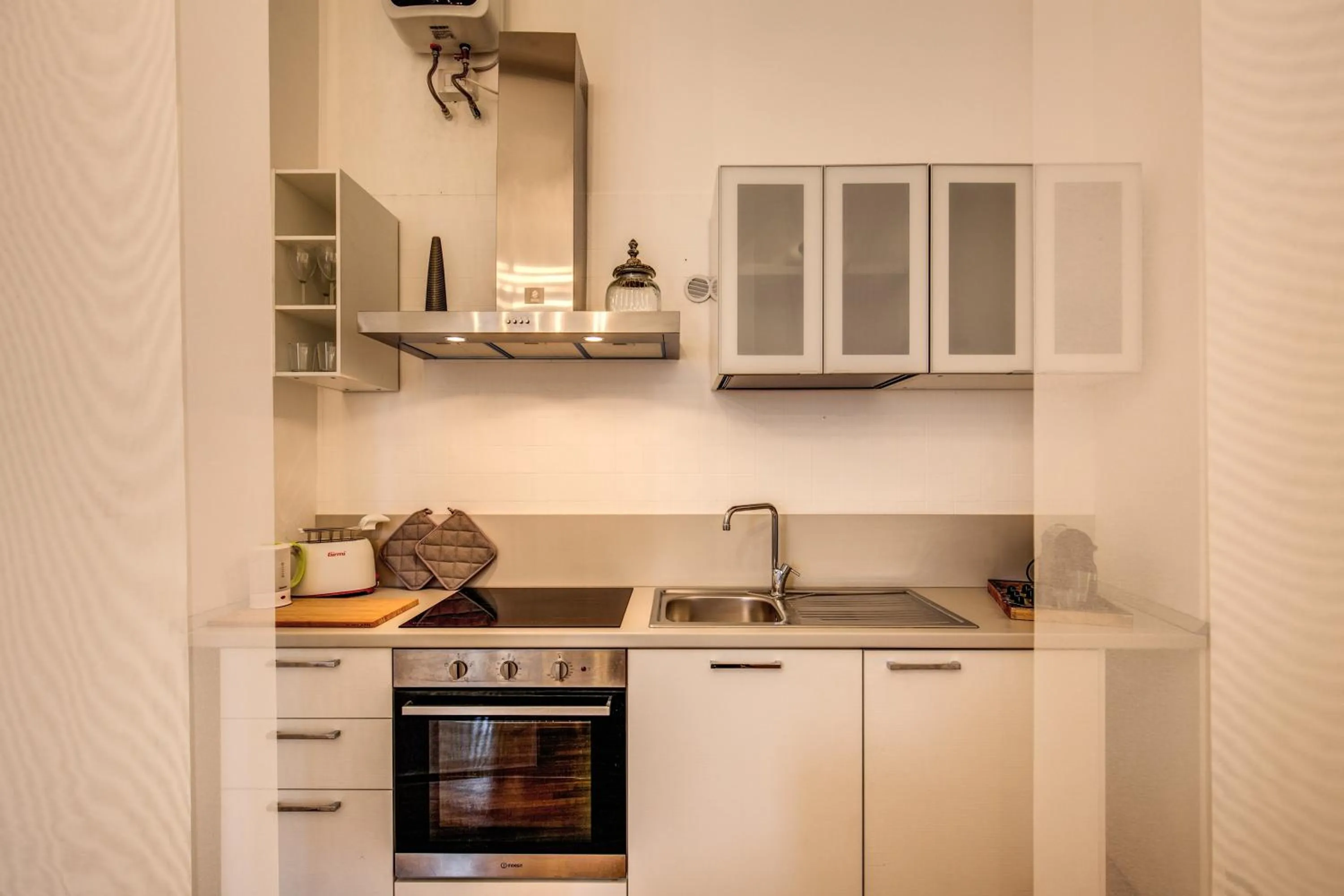 Kitchen or kitchenette in Elegant Apartment Behind the Colosseum