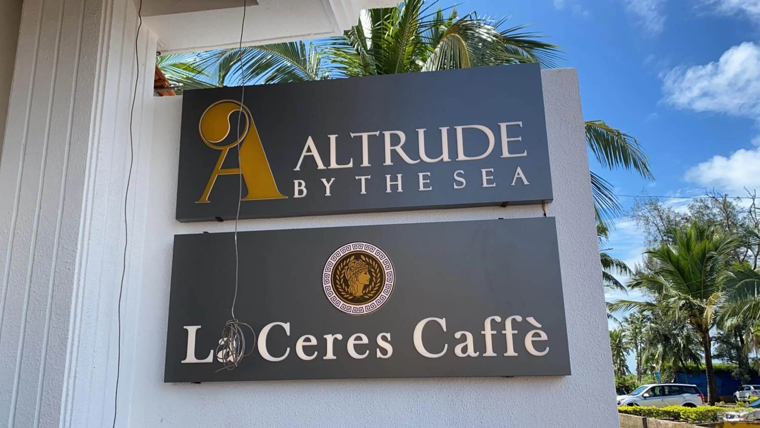 Property logo or sign in Altrude By The Sea