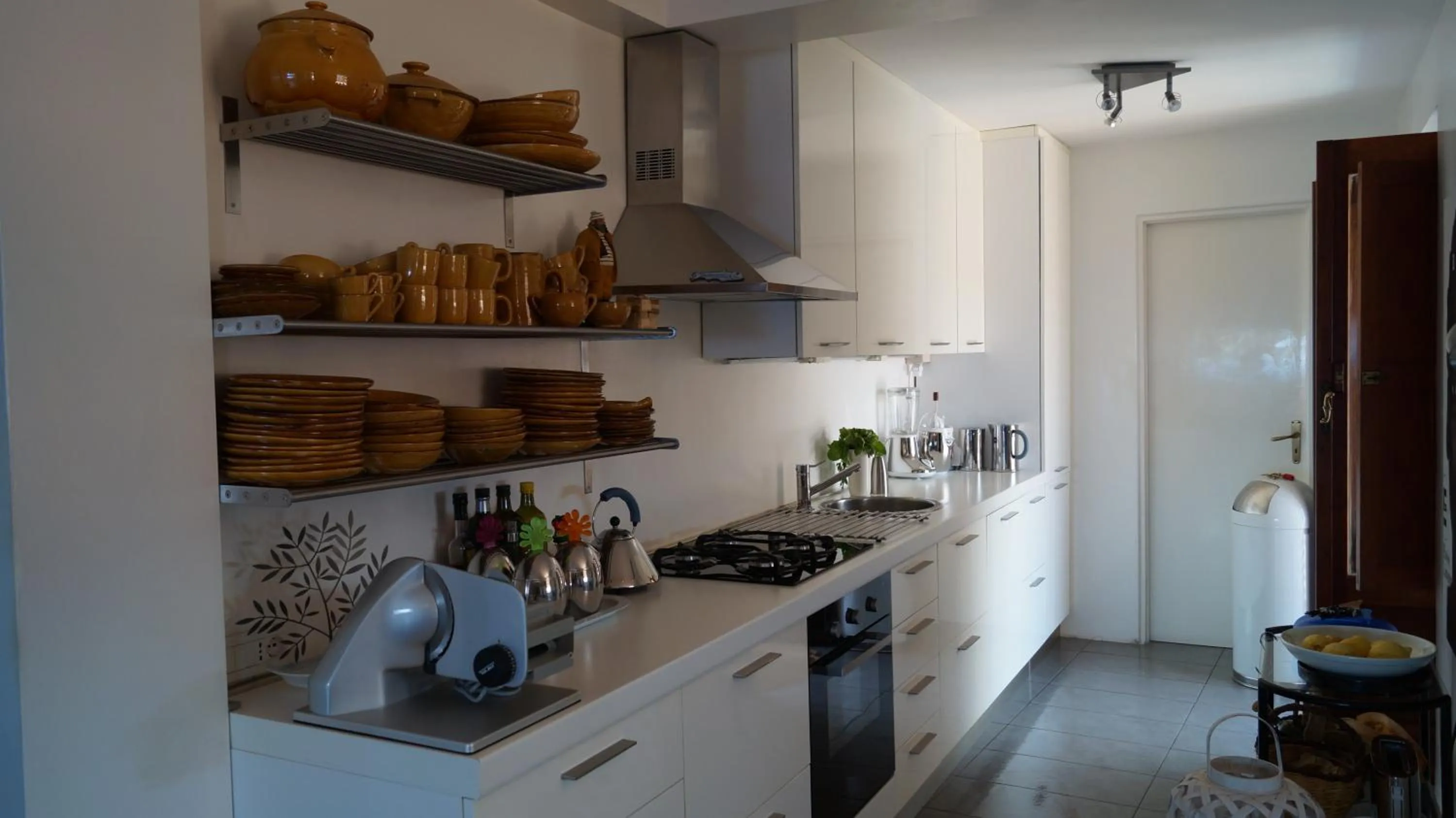 Communal kitchen in B&B Il Vicolo Di Pizzo