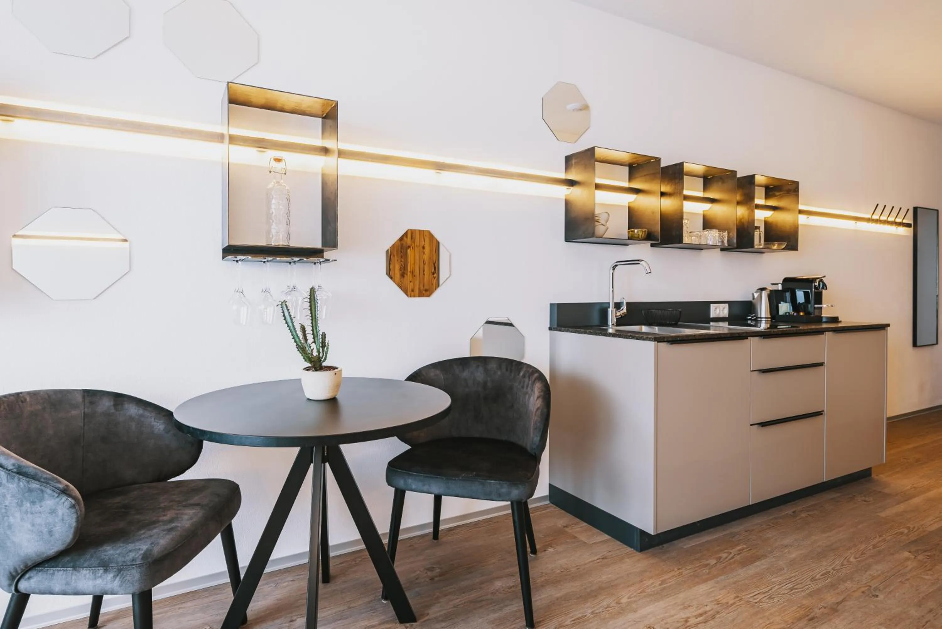 Seating area in Nikolaus by AvenidA Panoramic Wellness Suites