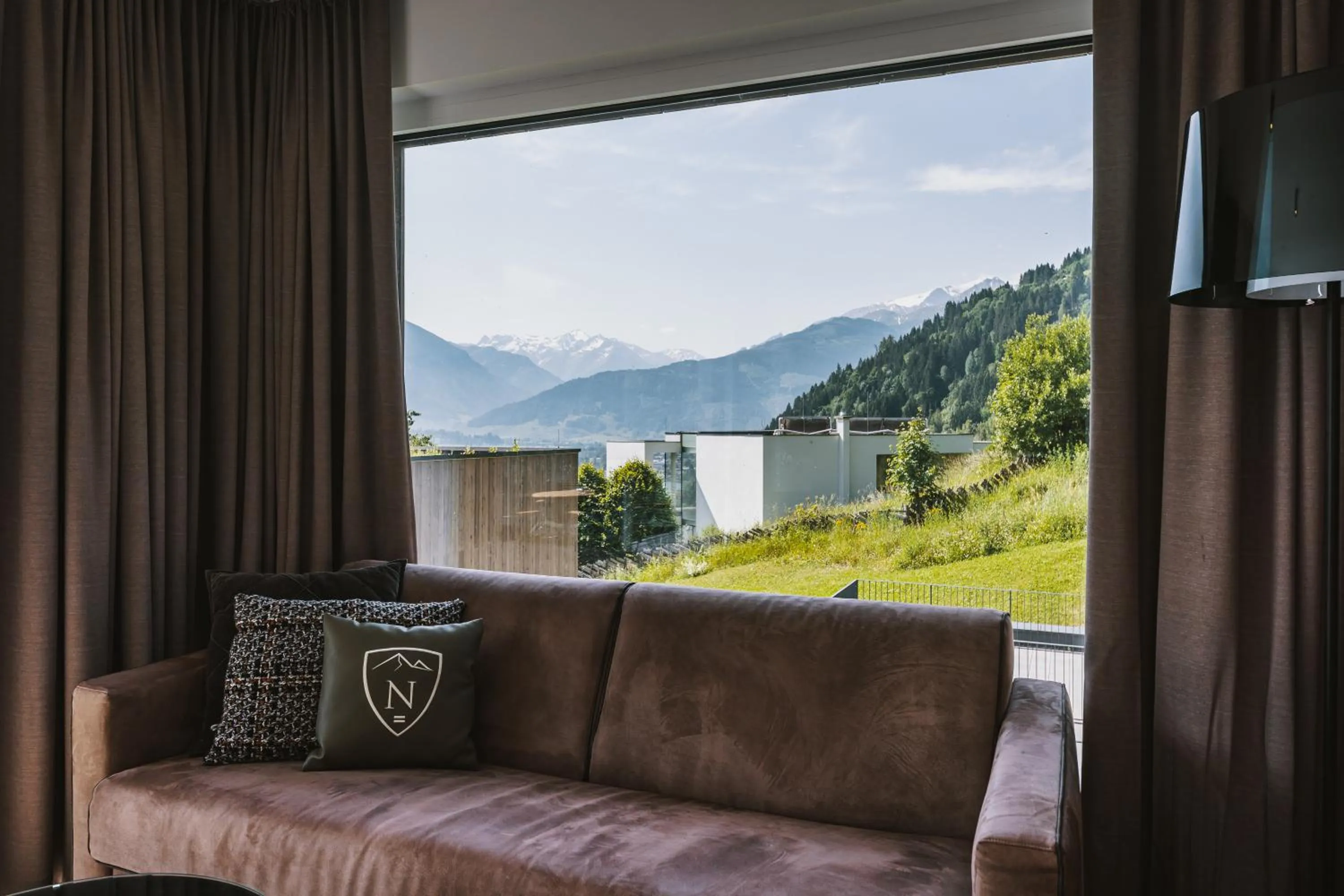 Living room in Nikolaus by AvenidA Panoramic Wellness Suites